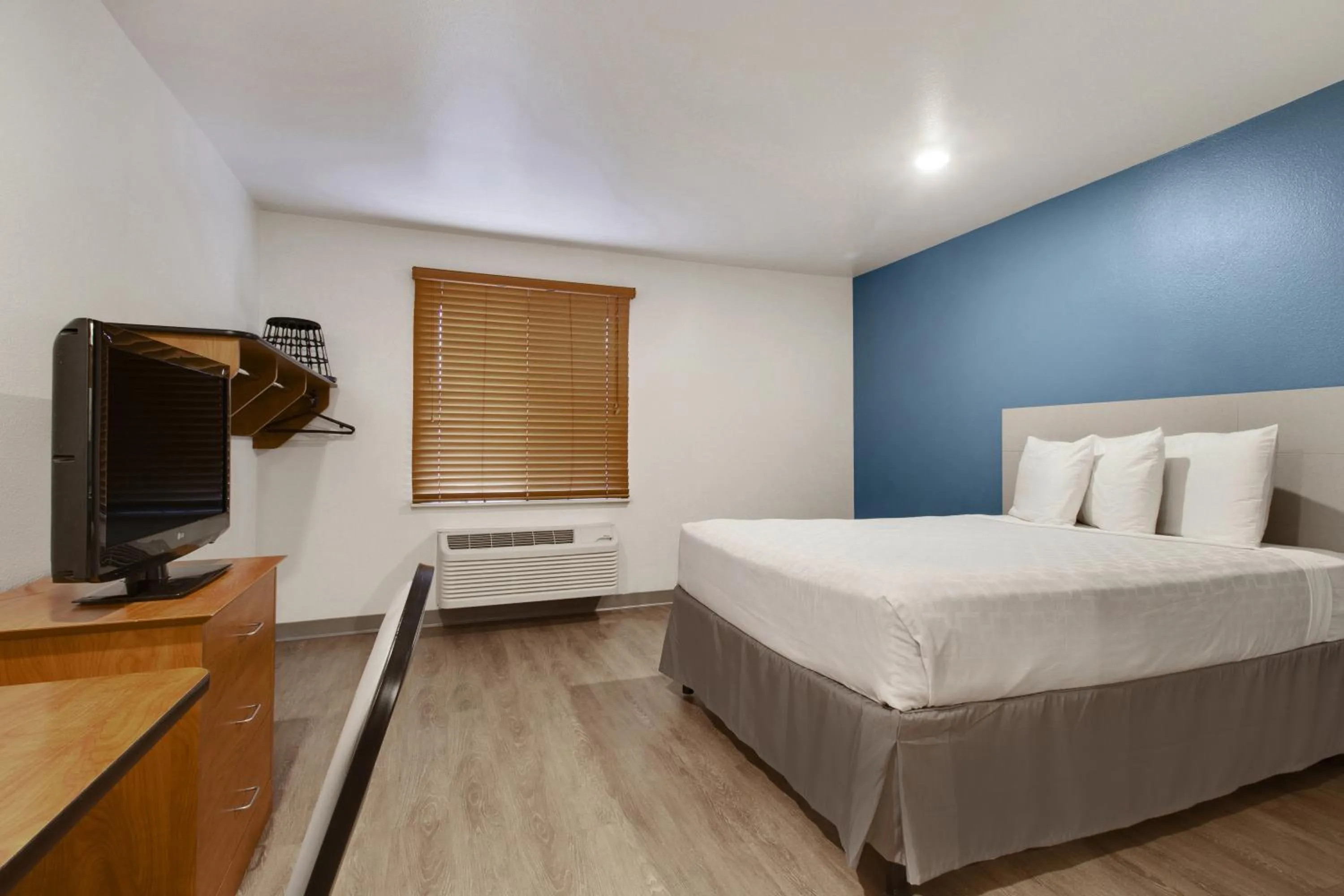 Bedroom, Bed in WoodSpring Suites Houston Westchase