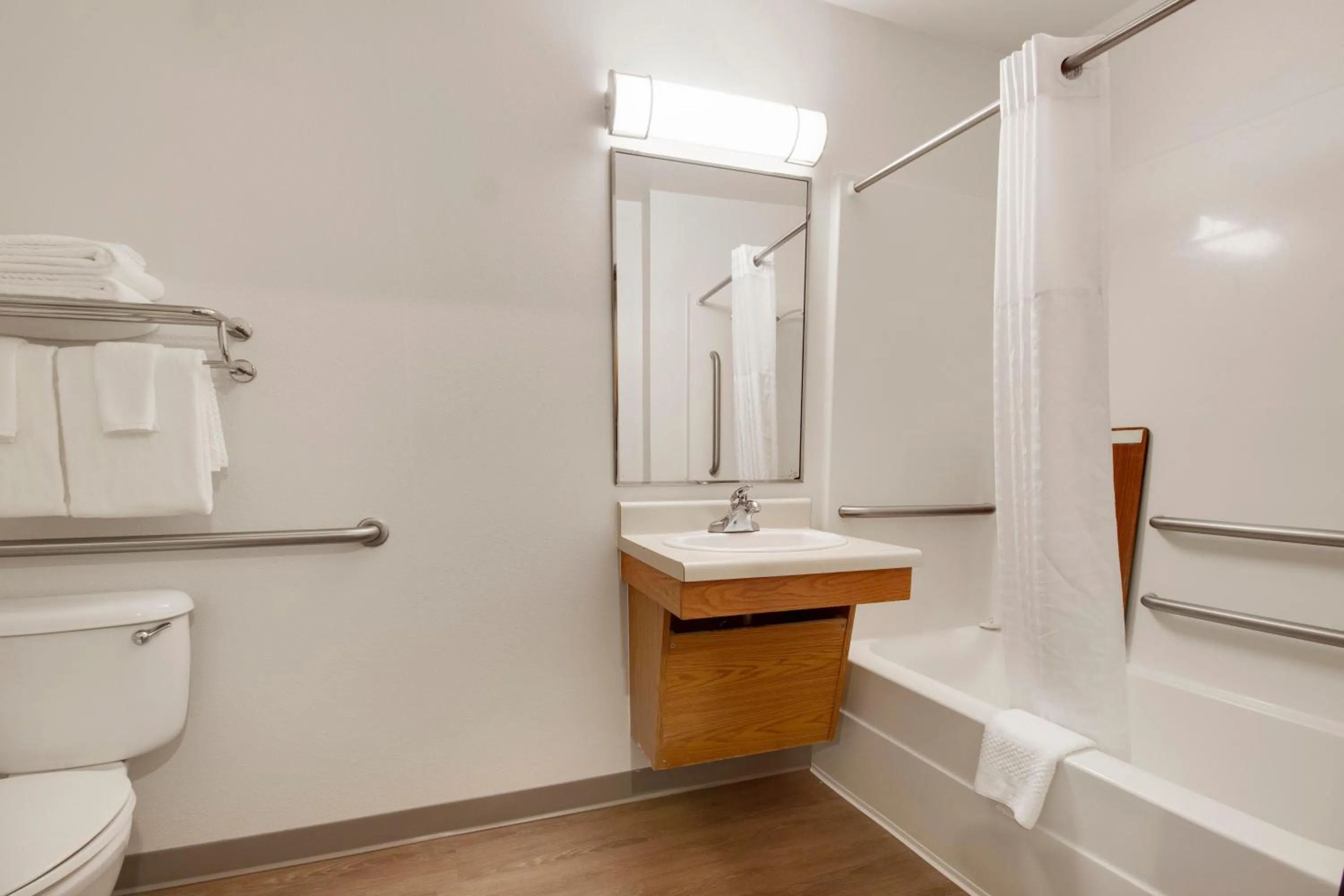 Bathroom in WoodSpring Suites Houston Willowbrook