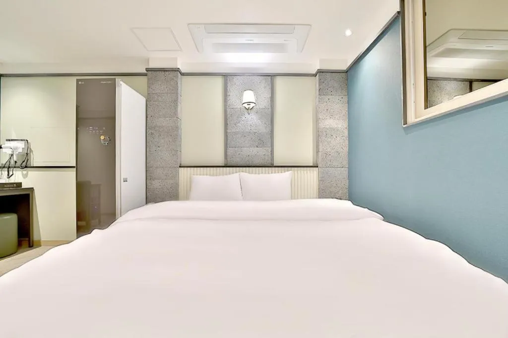 Bed in Daegu Hotel Rubato