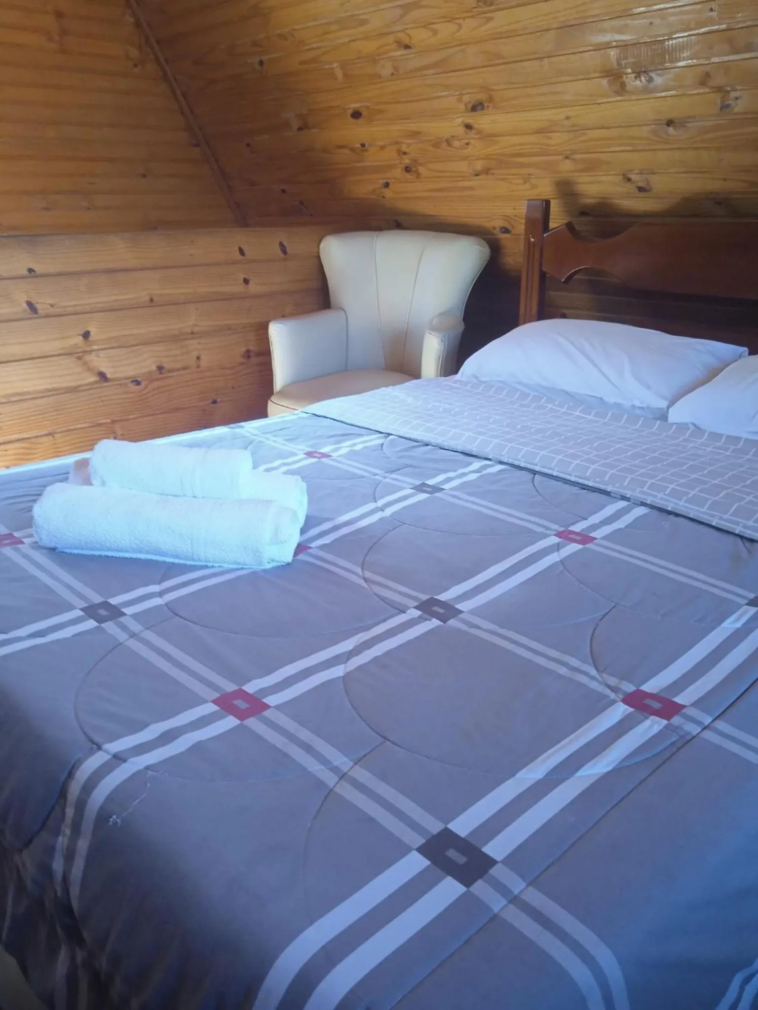 Bed in Pousada Chale Pico da Bandeira