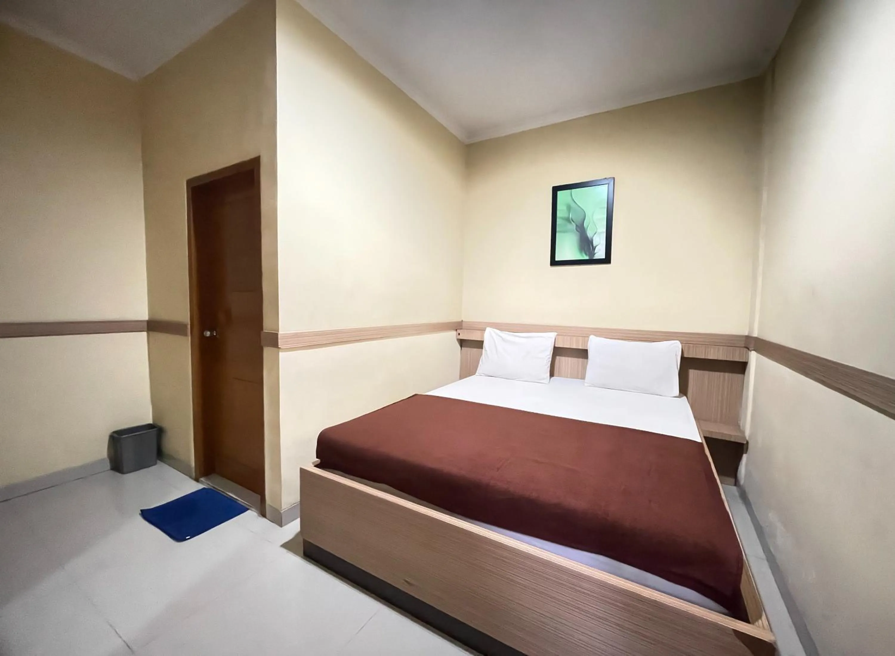 Bed in Hotel Cemara Hijau