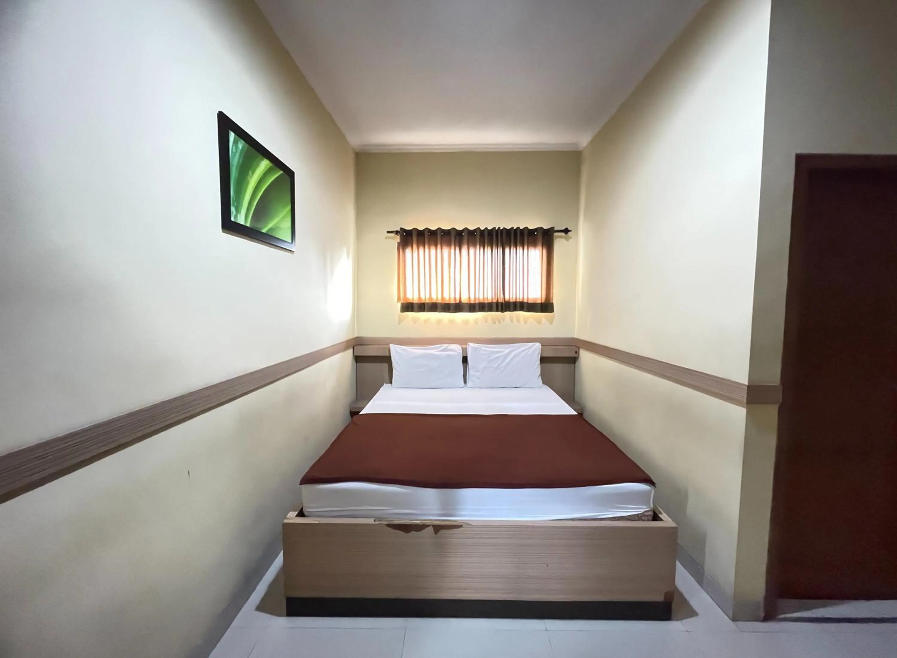 Bed in Hotel Cemara Hijau