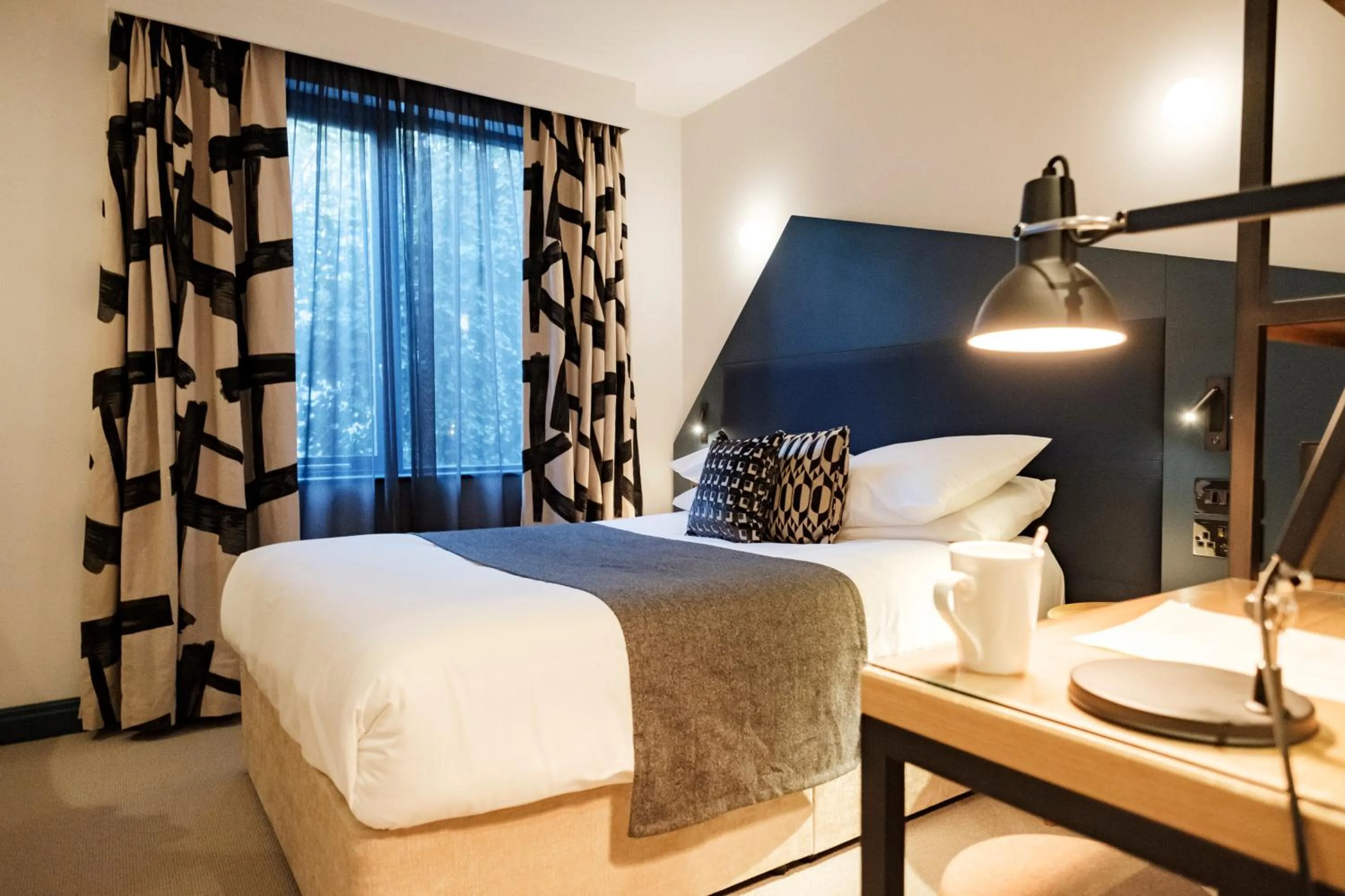 Bed in The Fox & Goose Hotel