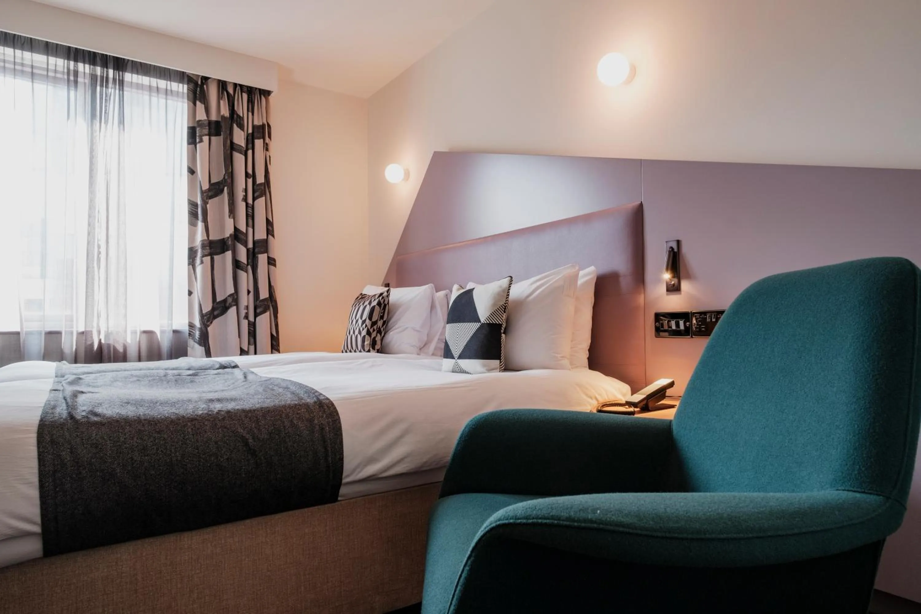 Bed in The Fox & Goose Hotel