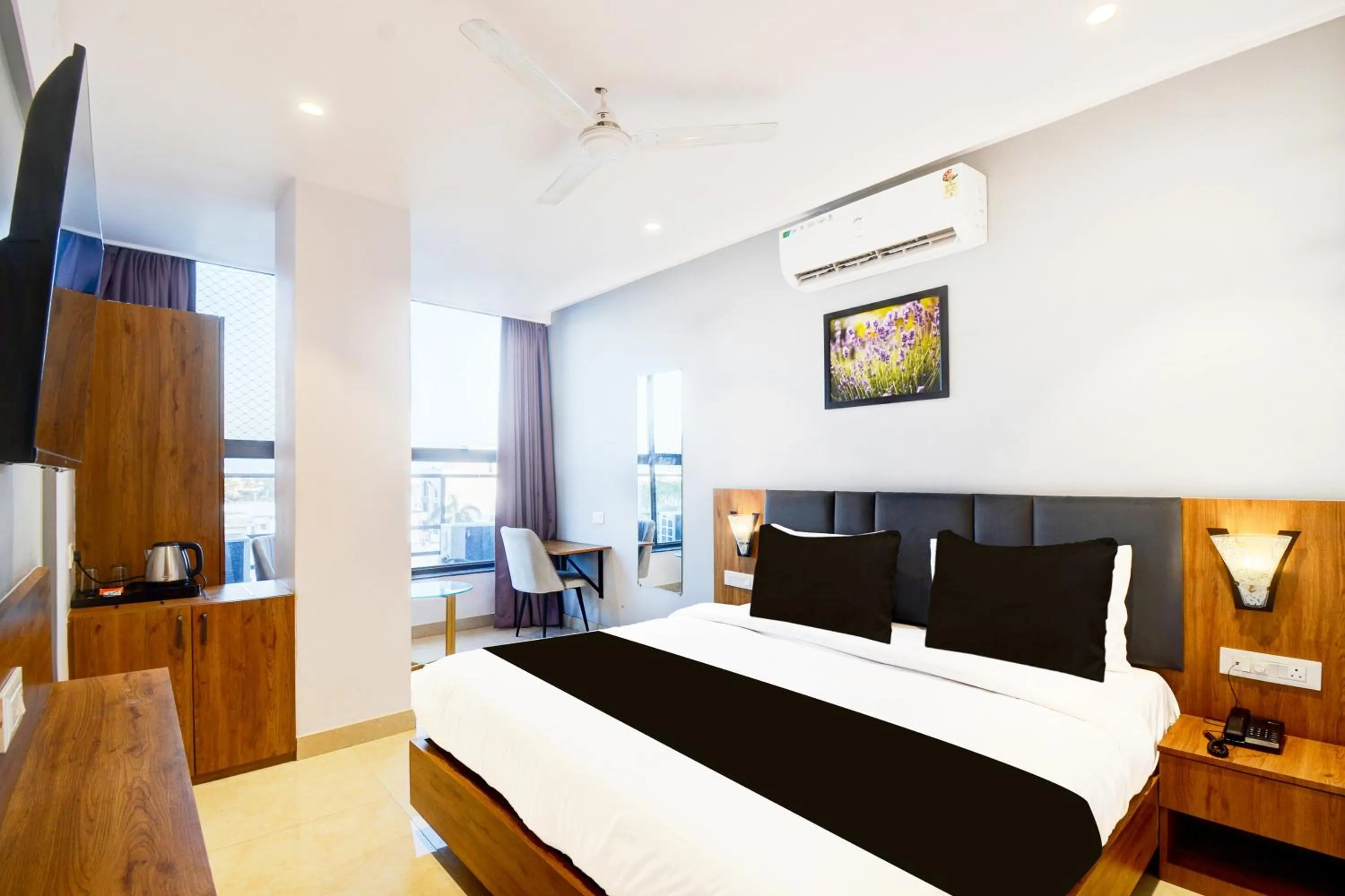 Bedroom, Bed in Super Townhouse Shobhagpura Formerly Fragrance Hotel