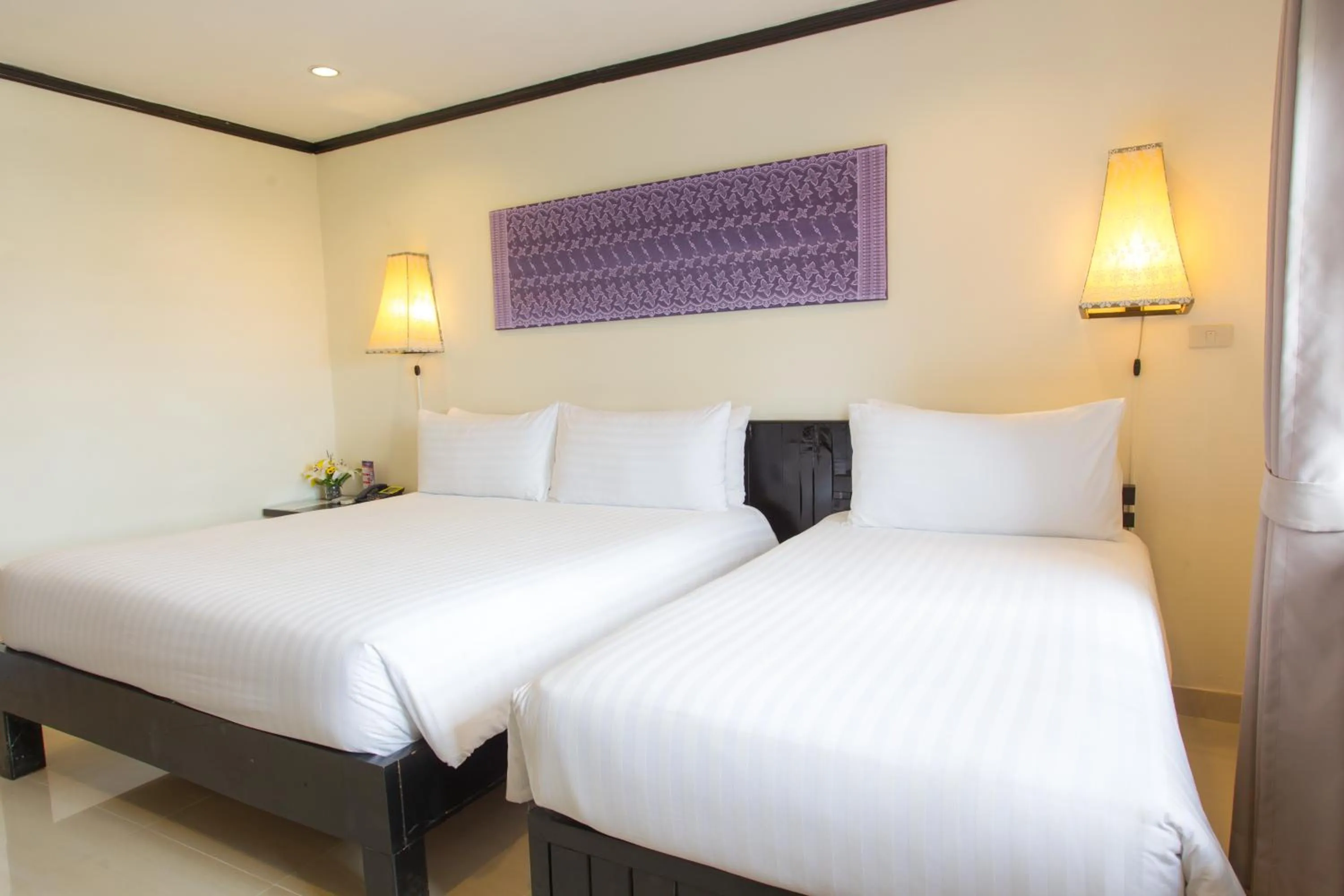Bed in Golden Tulip Essential Pattaya