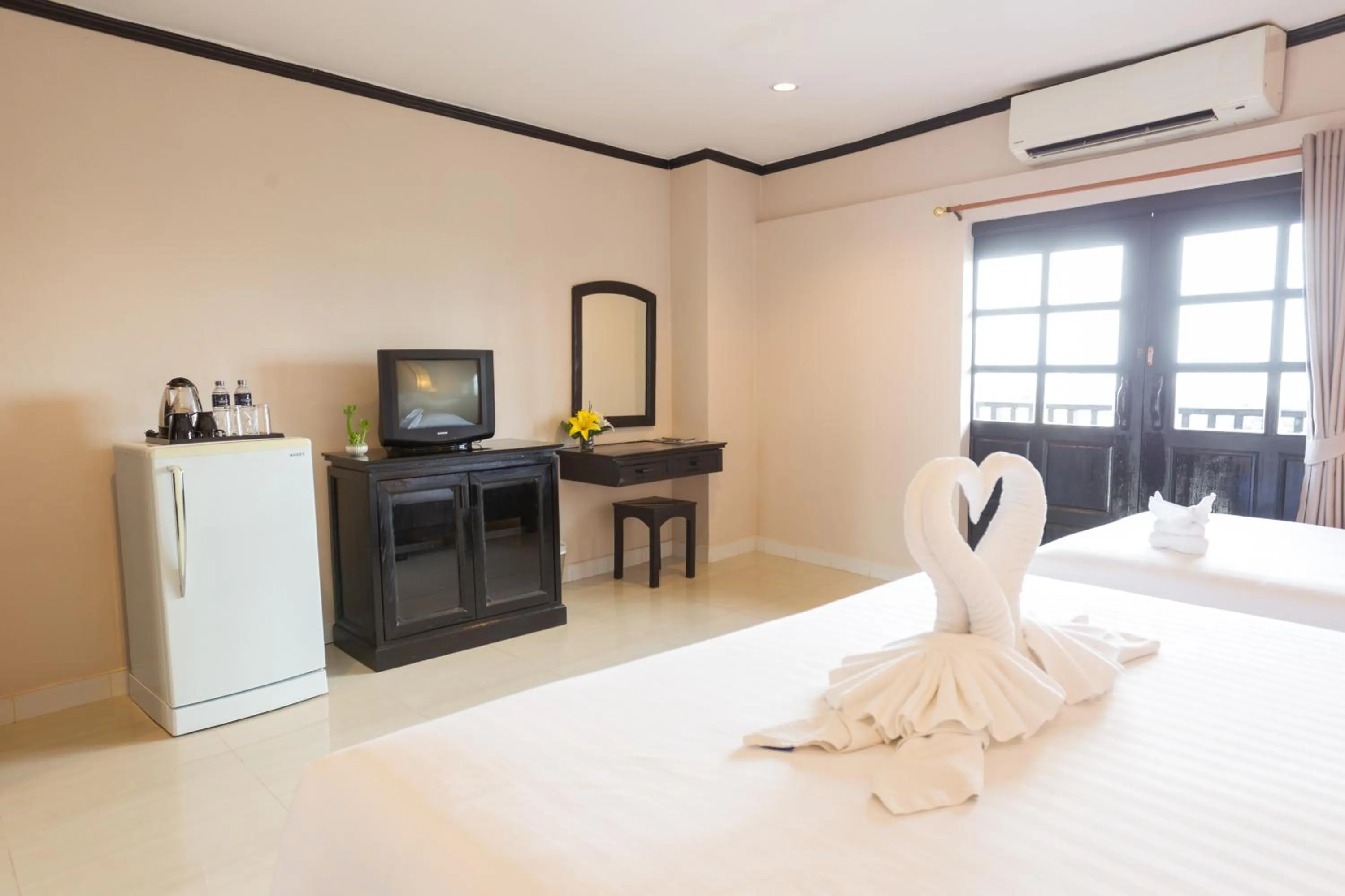 Bedroom in Golden Tulip Essential Pattaya