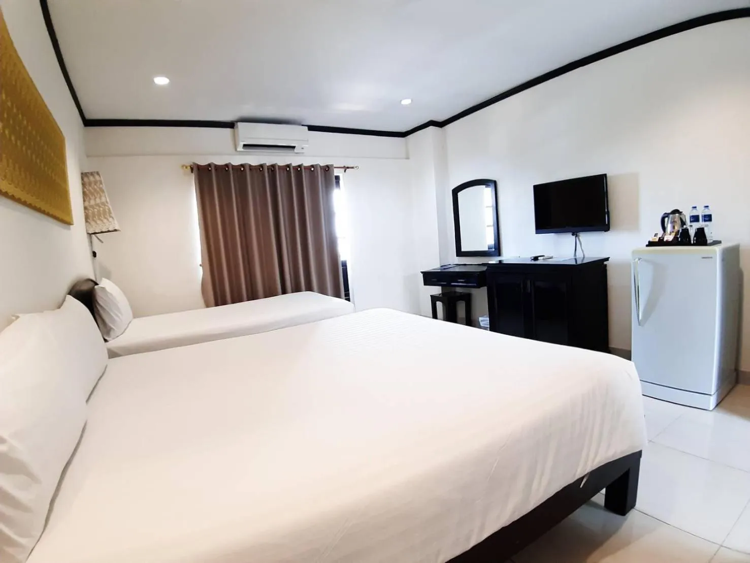 Bed in Golden Tulip Essential Pattaya