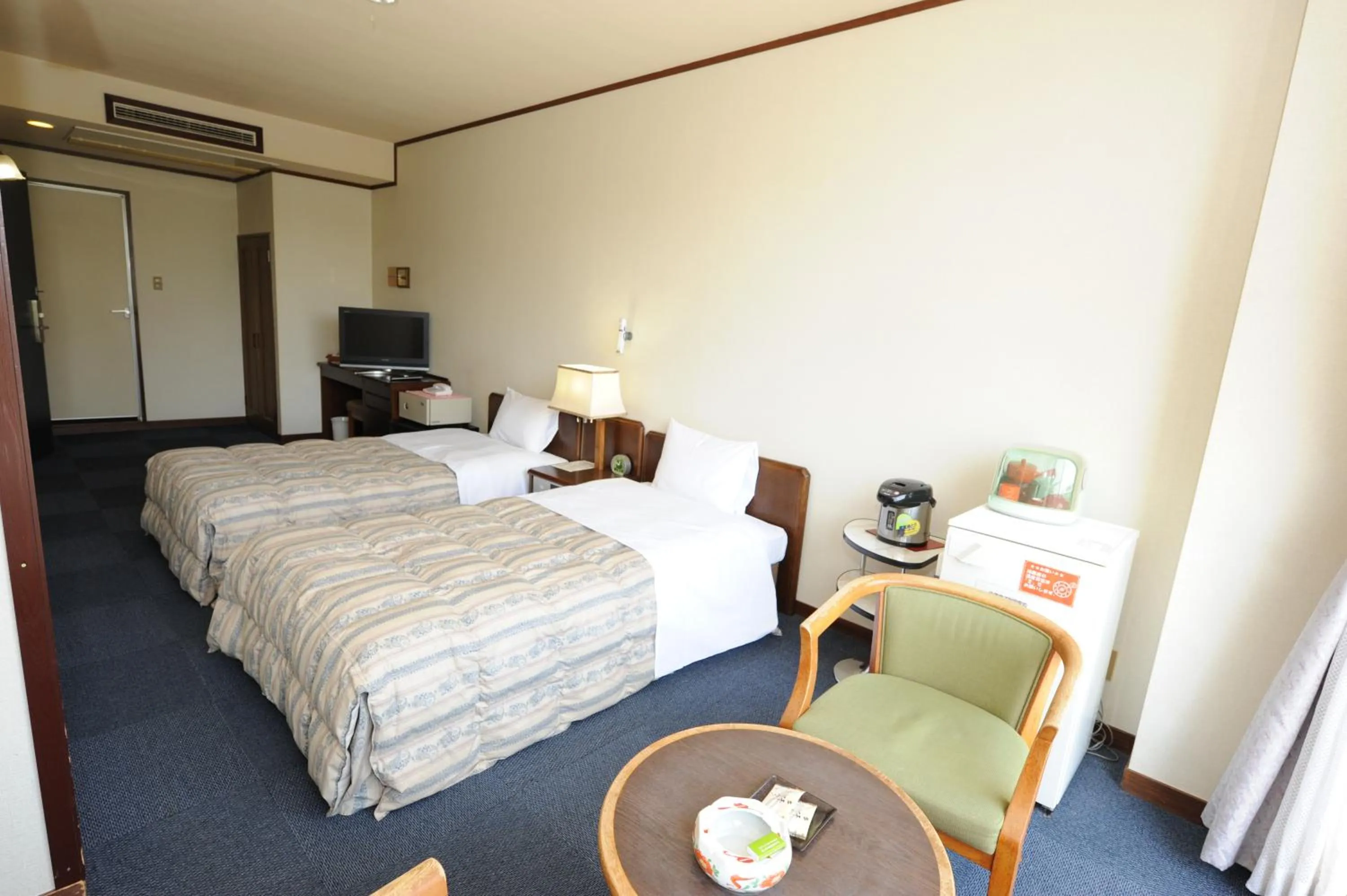 Bed in Nanpeidai Onsen Hotel