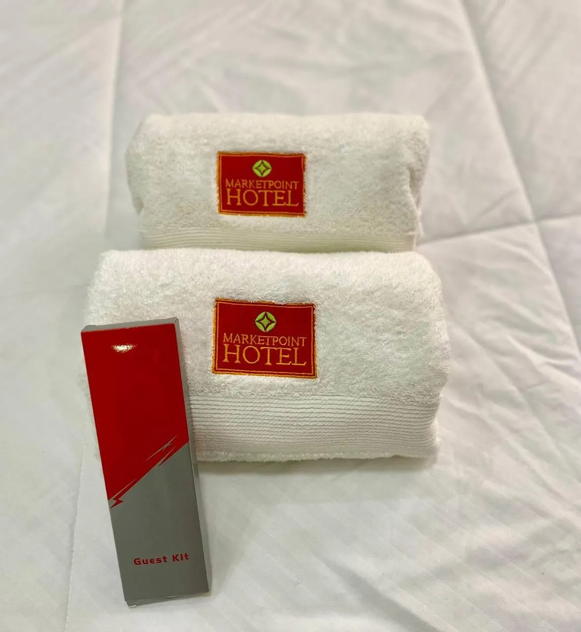 Bed in Marketpoint Hotel