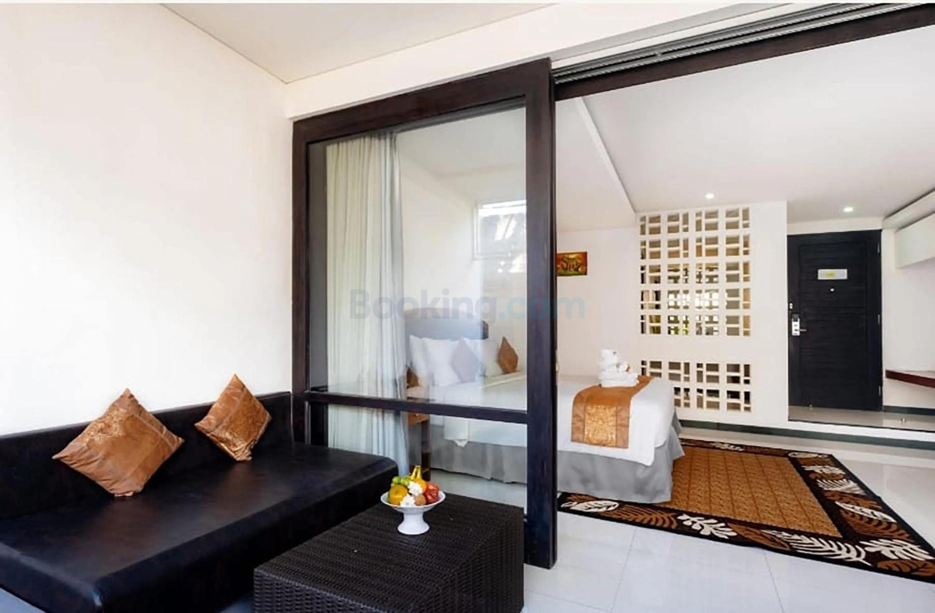 Bed in The Kanjeng Suites Kuta Galeria - Bali