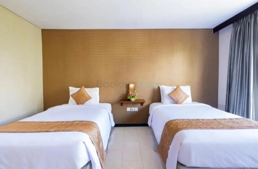 Bed in The Kanjeng Suites Kuta Galeria - Bali