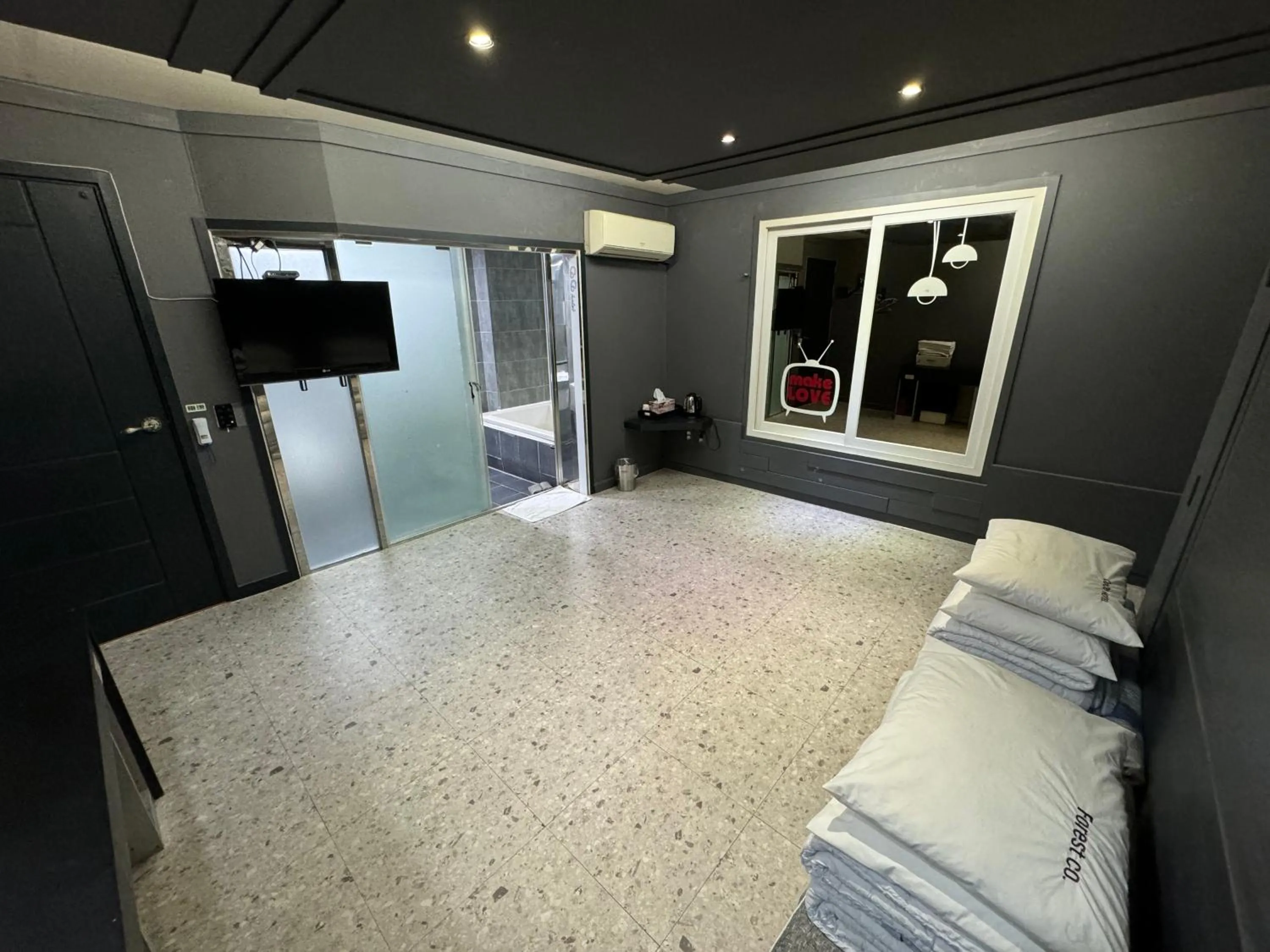 Bed in Songjeong Coco Hotel