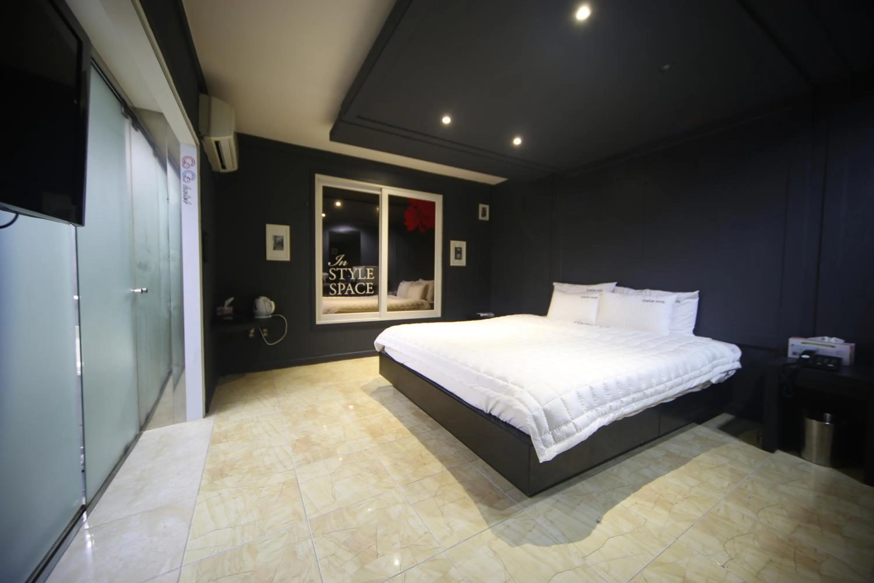 Bed in Songjeong Coco Hotel