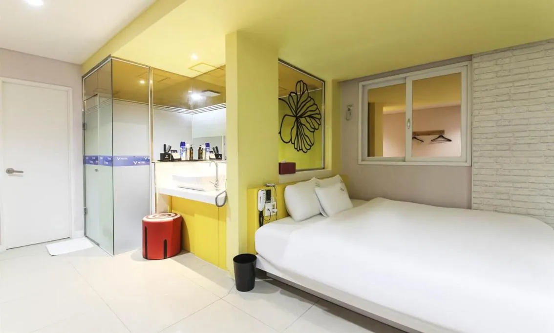 Bed in Songjeong V Hotel