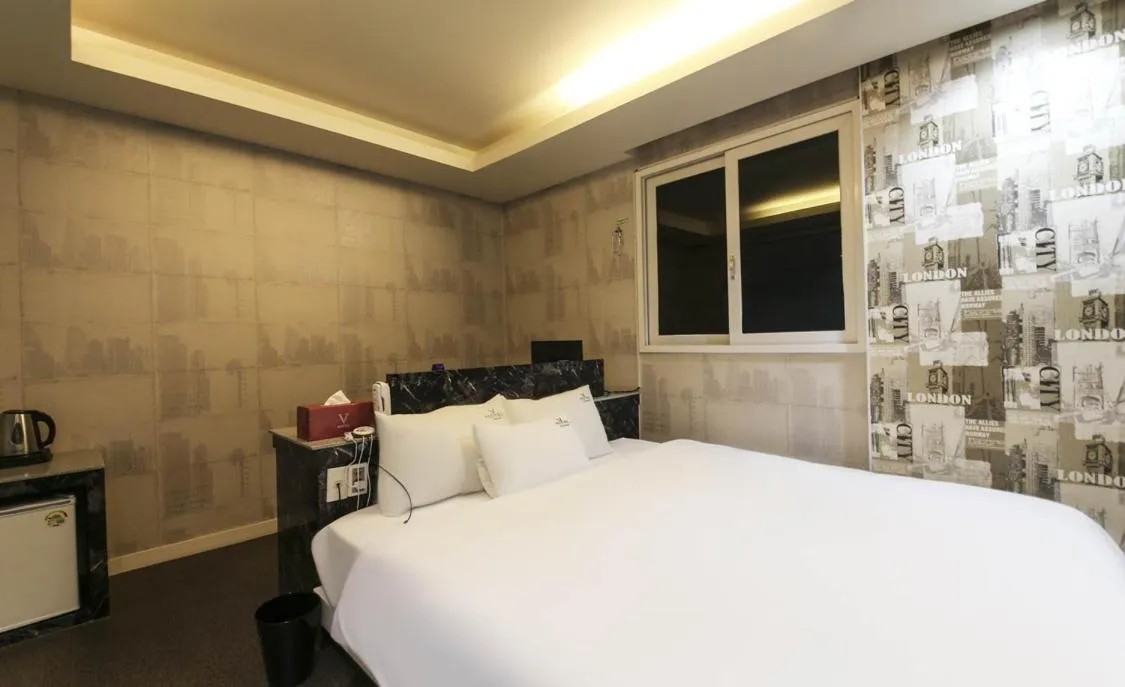 Bed in Songjeong V Hotel