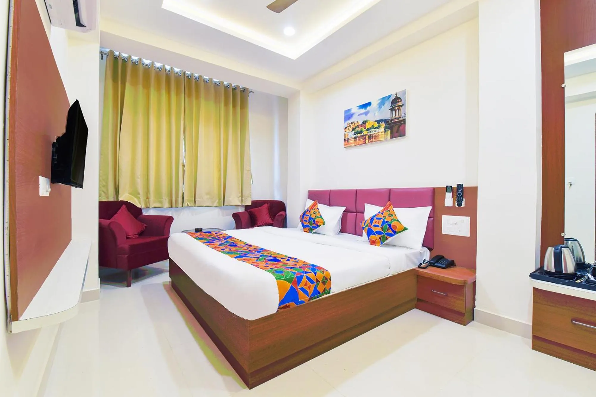 Bed in FabHotel Samrat Regency