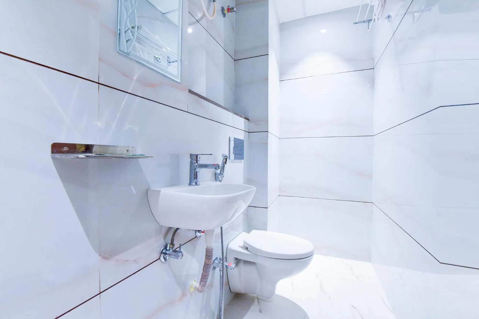 Bathroom in FabHotel Samrat Regency