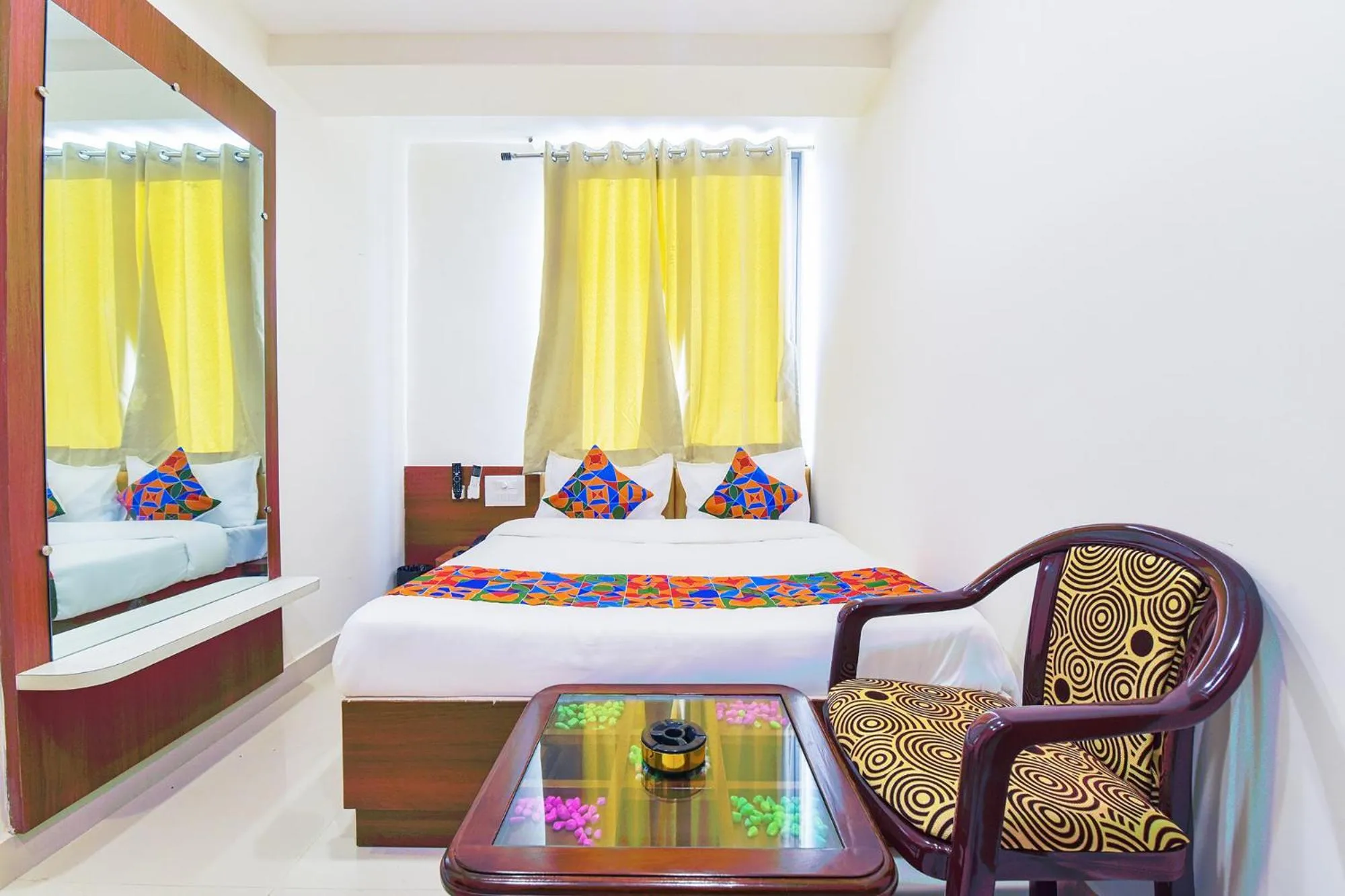 Bed in FabHotel Samrat Regency