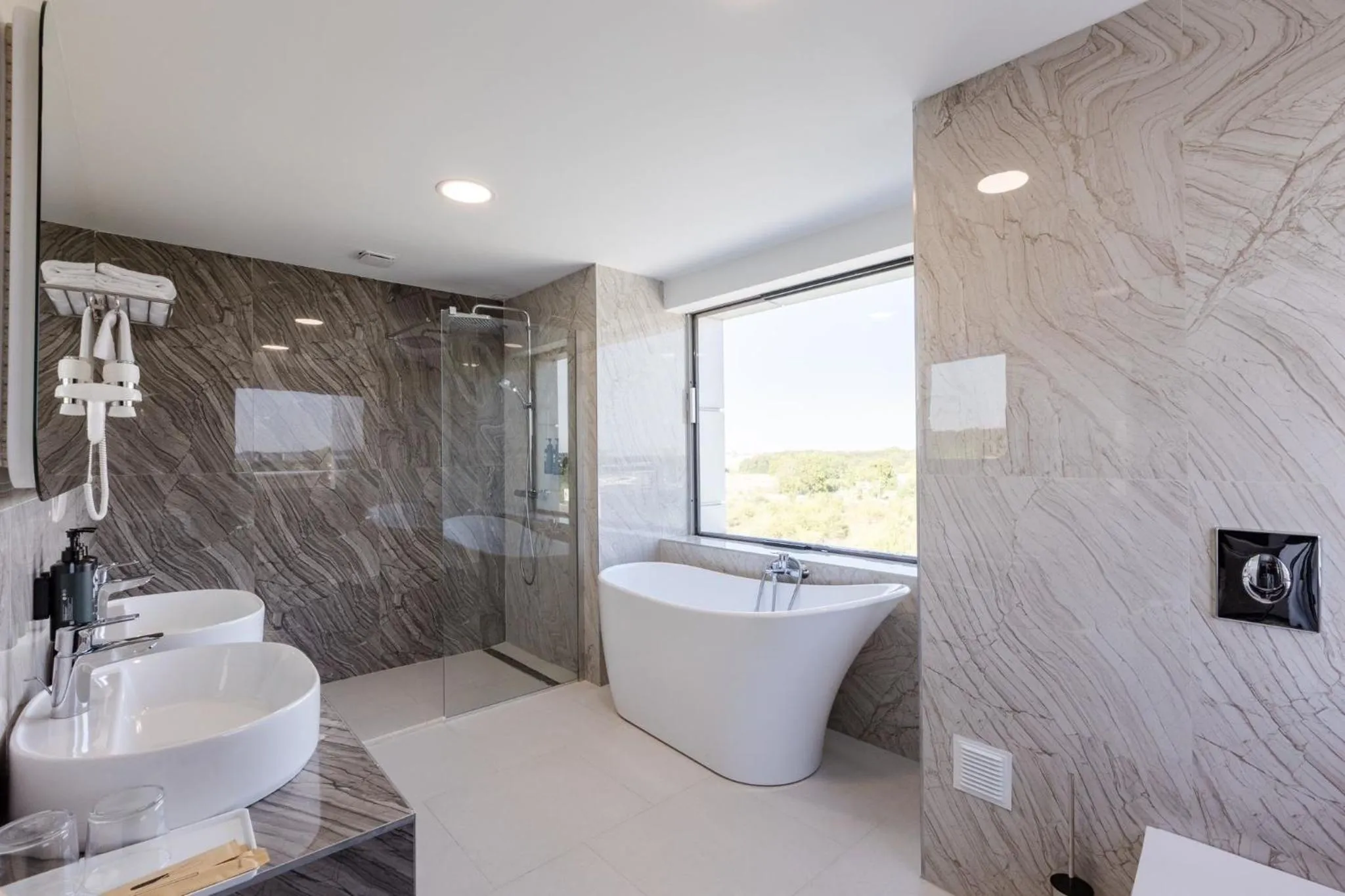 Shower in Ramada by Wyndham Bucharest Otopeni Airport