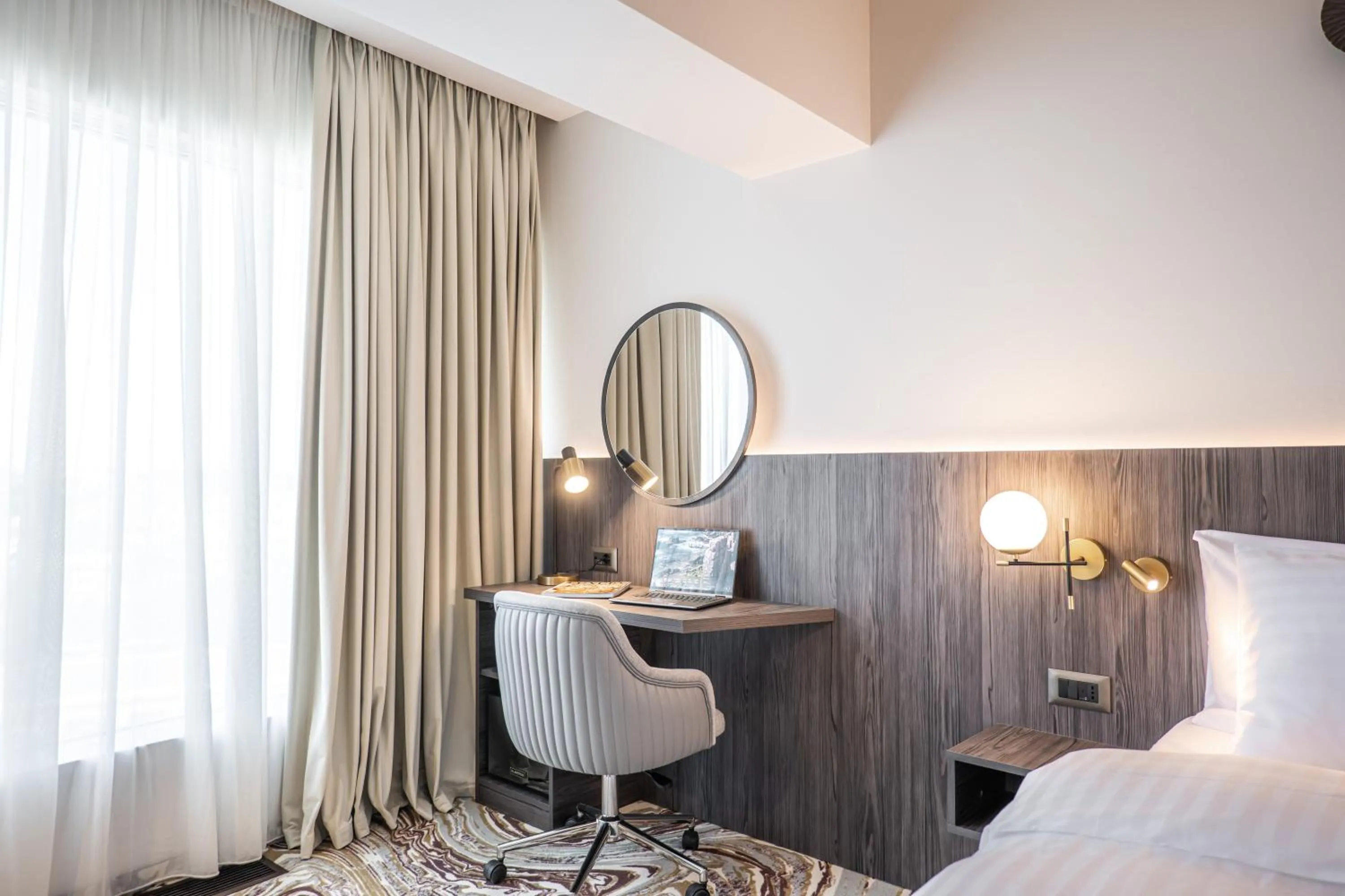 Bed in Ramada by Wyndham Bucharest Otopeni Airport