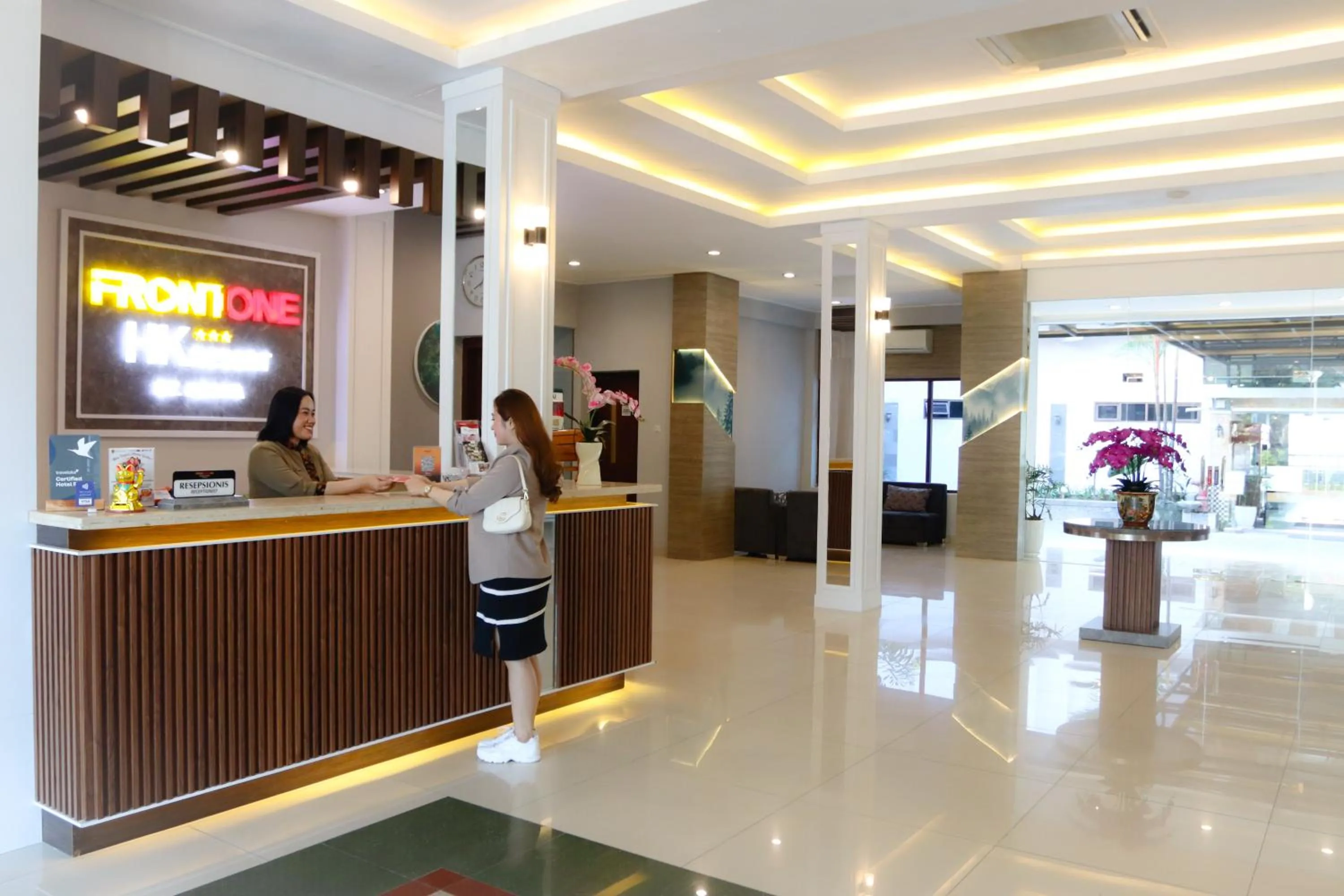 People in Front One HK Resort Simpang Lima