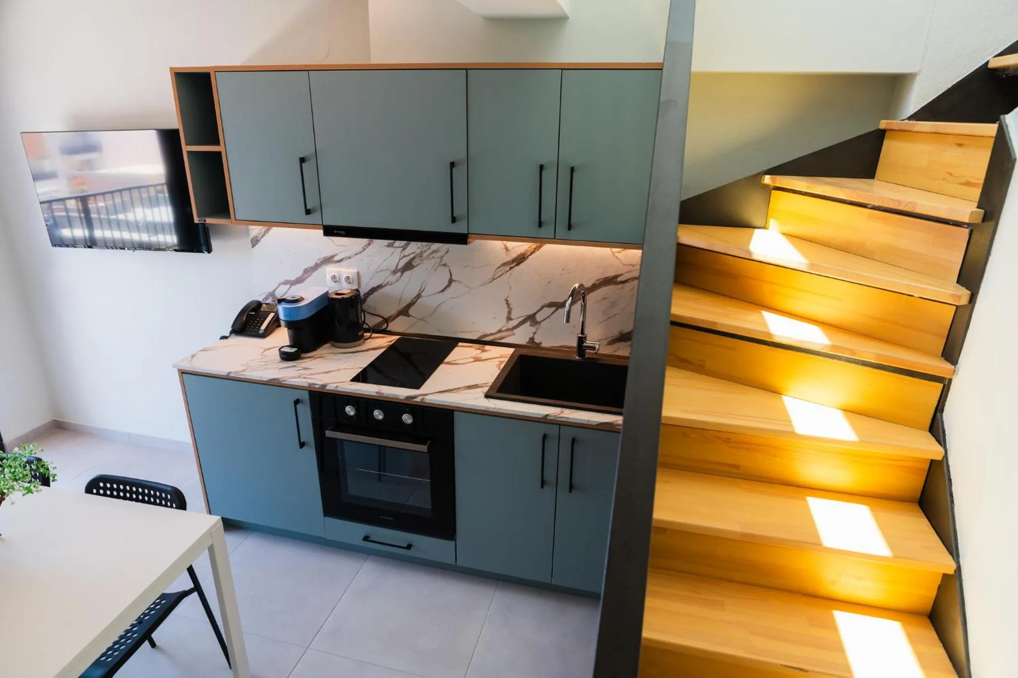 Kitchen or kitchenette in Oktolia suites