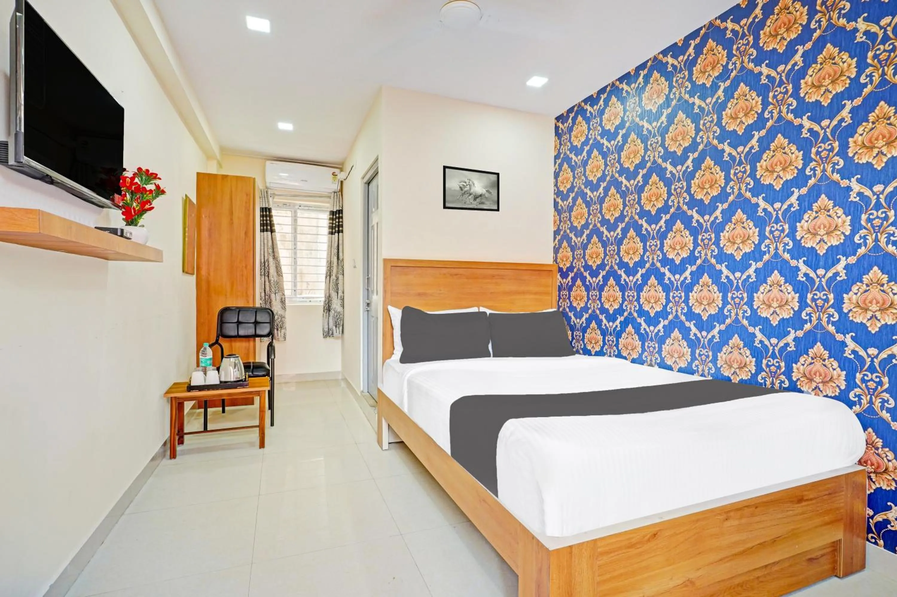 Bedroom in Hotel O Chalukya Comfort