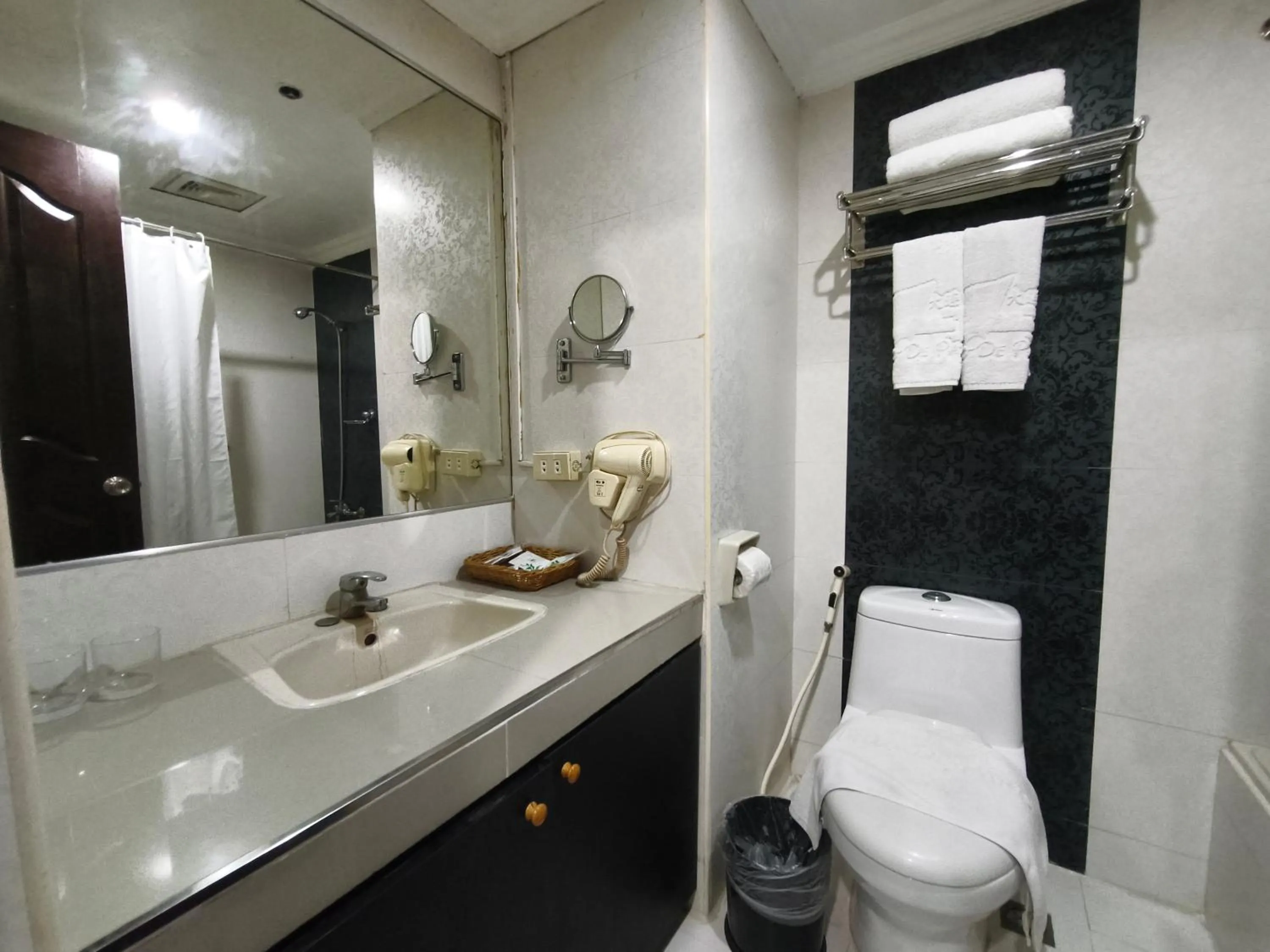 Bathroom in Lido De Paris Hotel