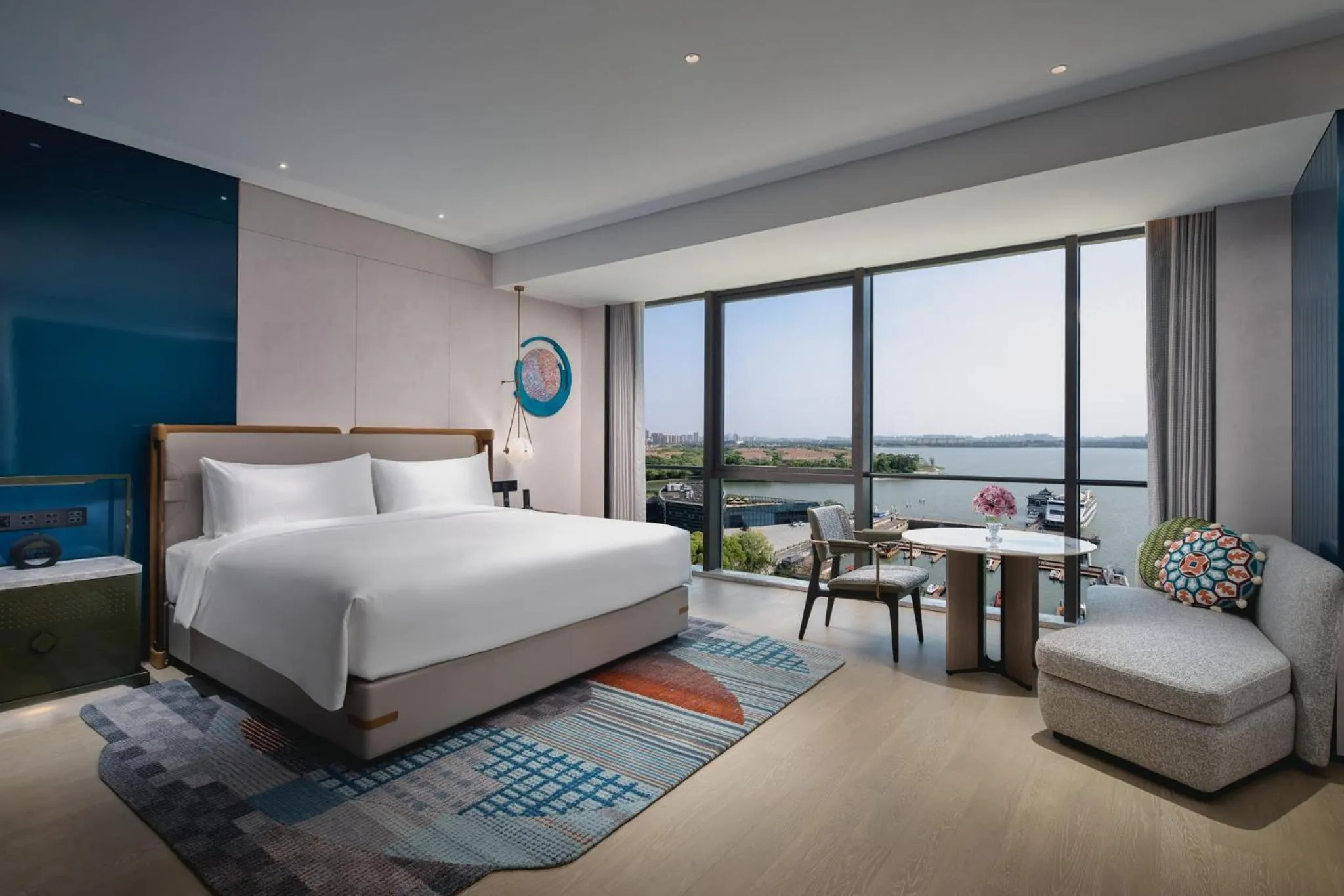 Photo of the whole room, Bed in Hotel Indigo Suzhou Jinji Lake by IHG