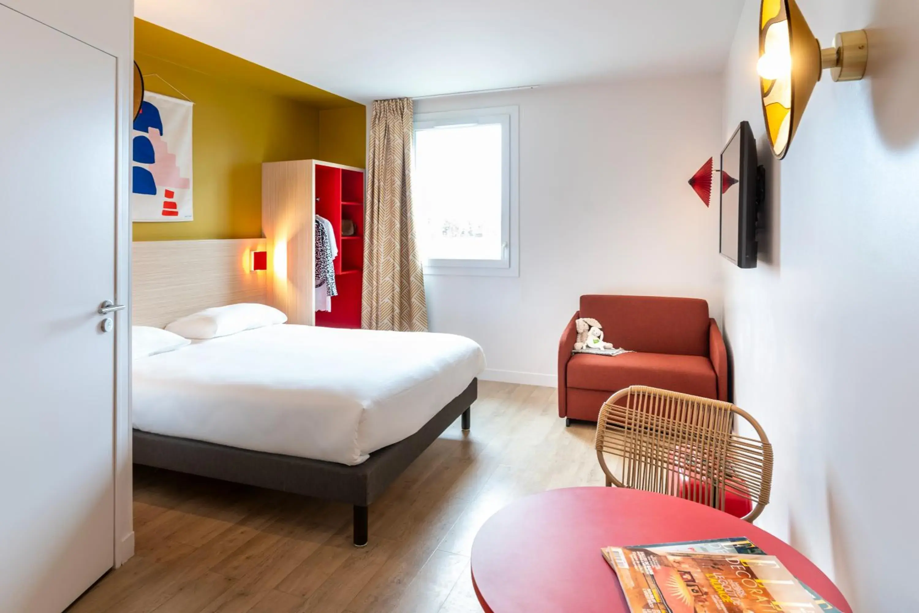 Standard Room with one double and one single bed in ibis Styles Prévessin Genève Aéroport Standard Room with one double and one single bed in ibis Styles Prévessin Genève Aéroport