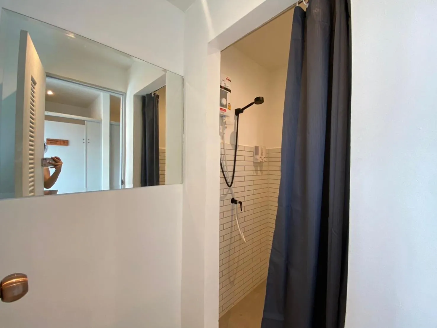 Bathroom in The Motuga Hostel Bangkok