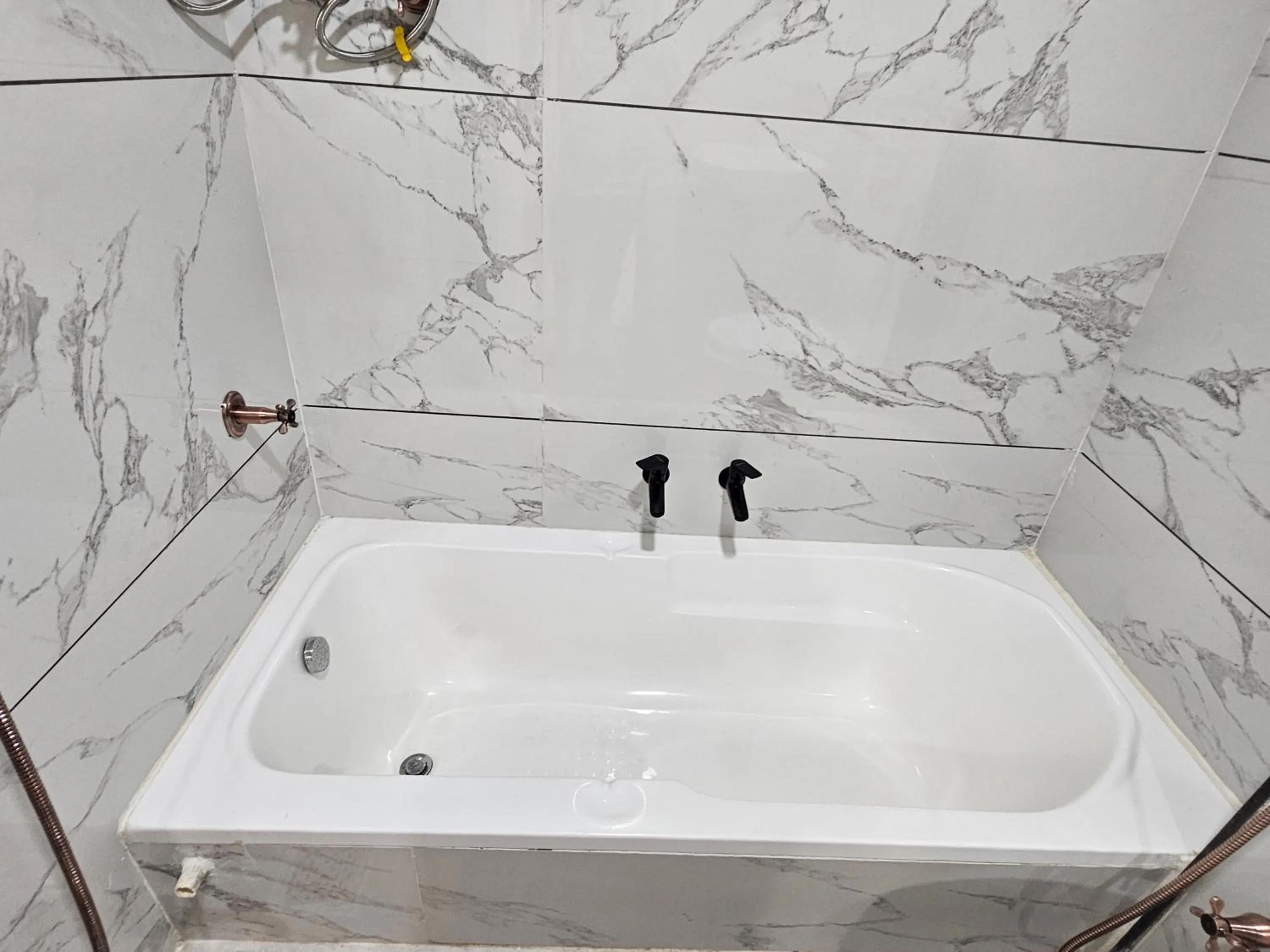 Bathroom in The Eiffel Hotel & Banquet