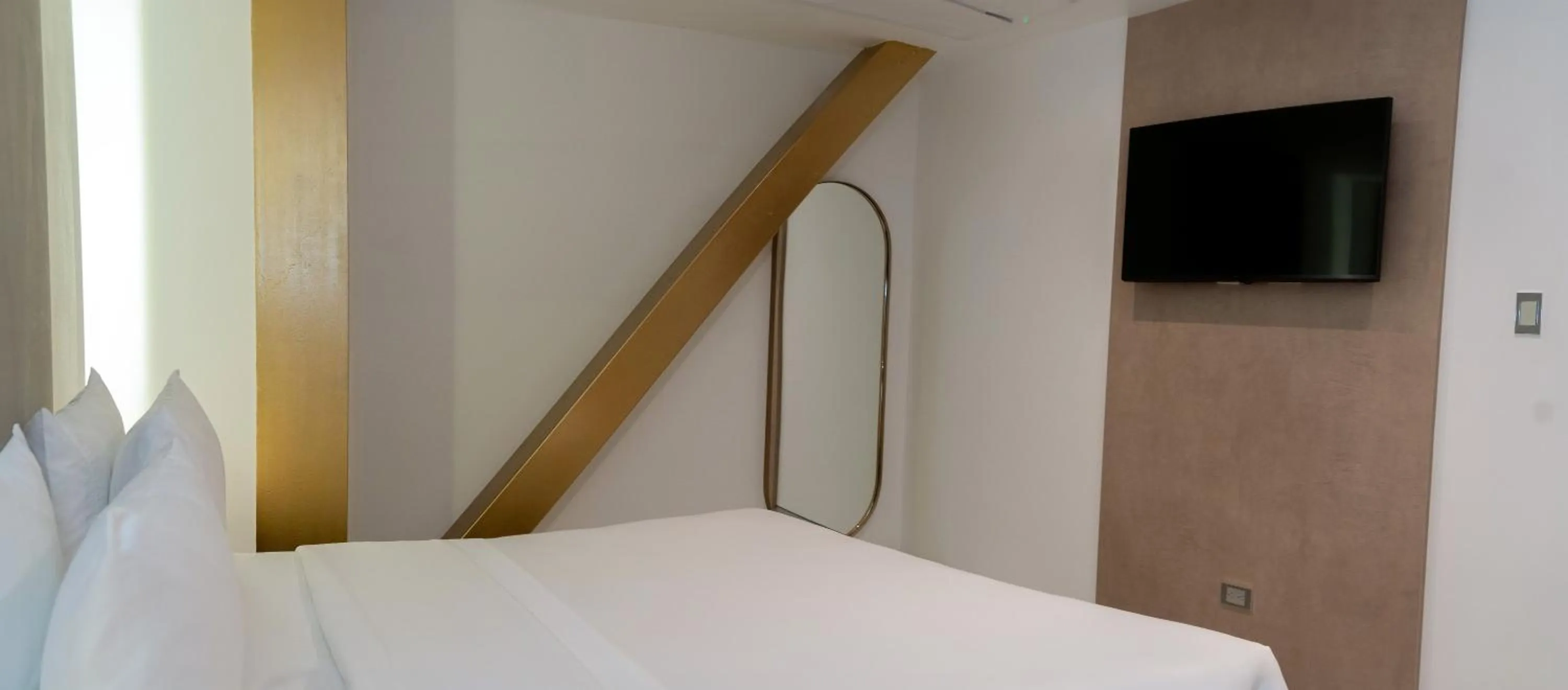 Bed in Delamar Hotel