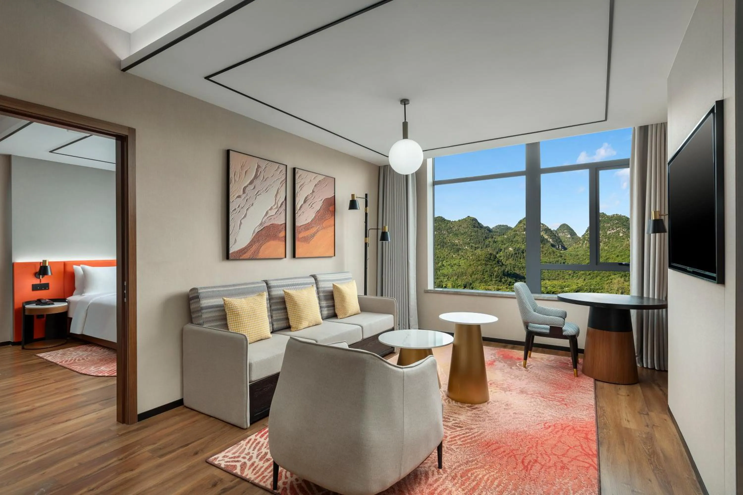 Communal lounge/ TV room in Hilton Garden Inn Xingyi Wanfenglin