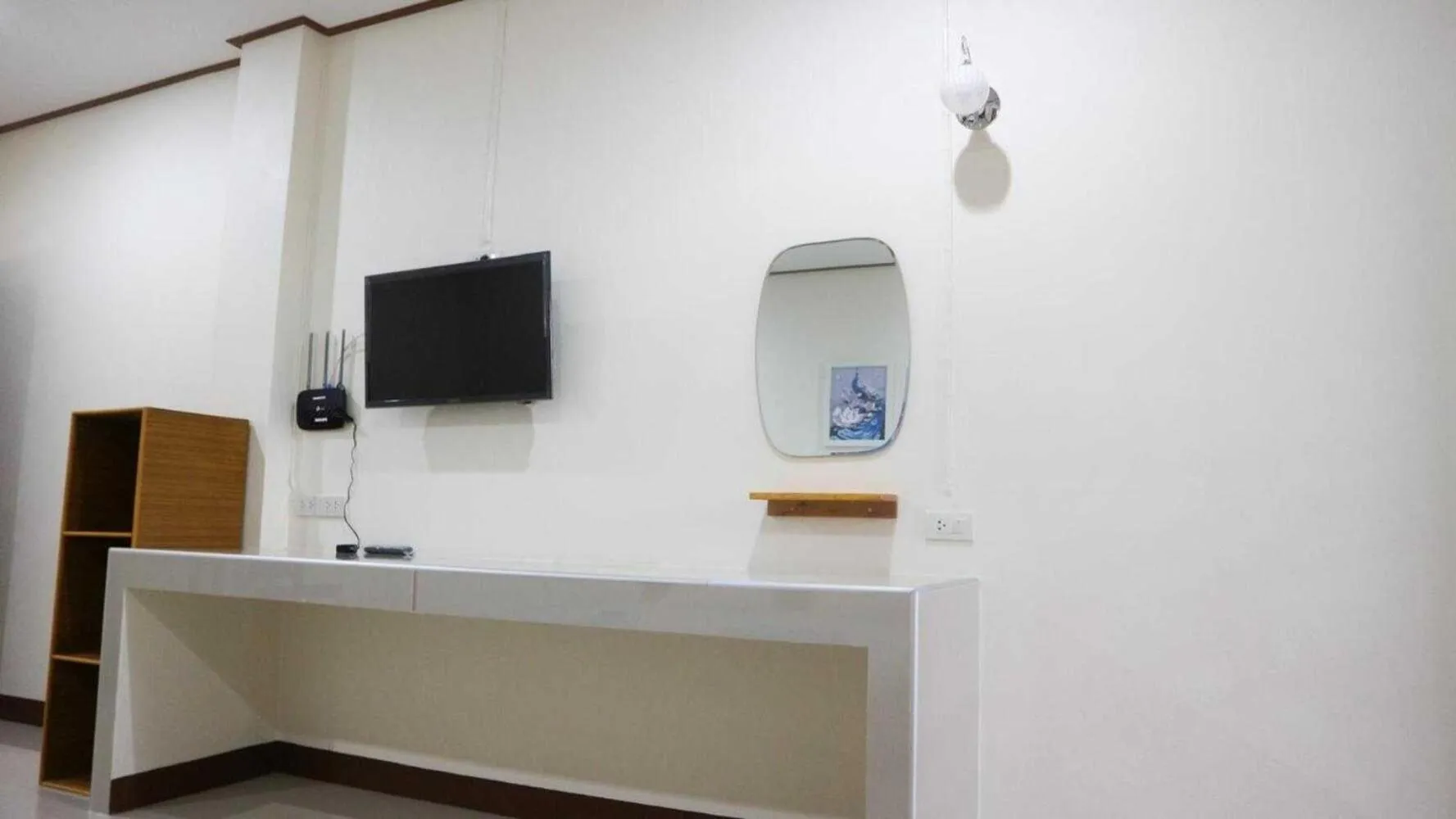 Lobby or reception in Capital O 75521 Sang Siri Apartment