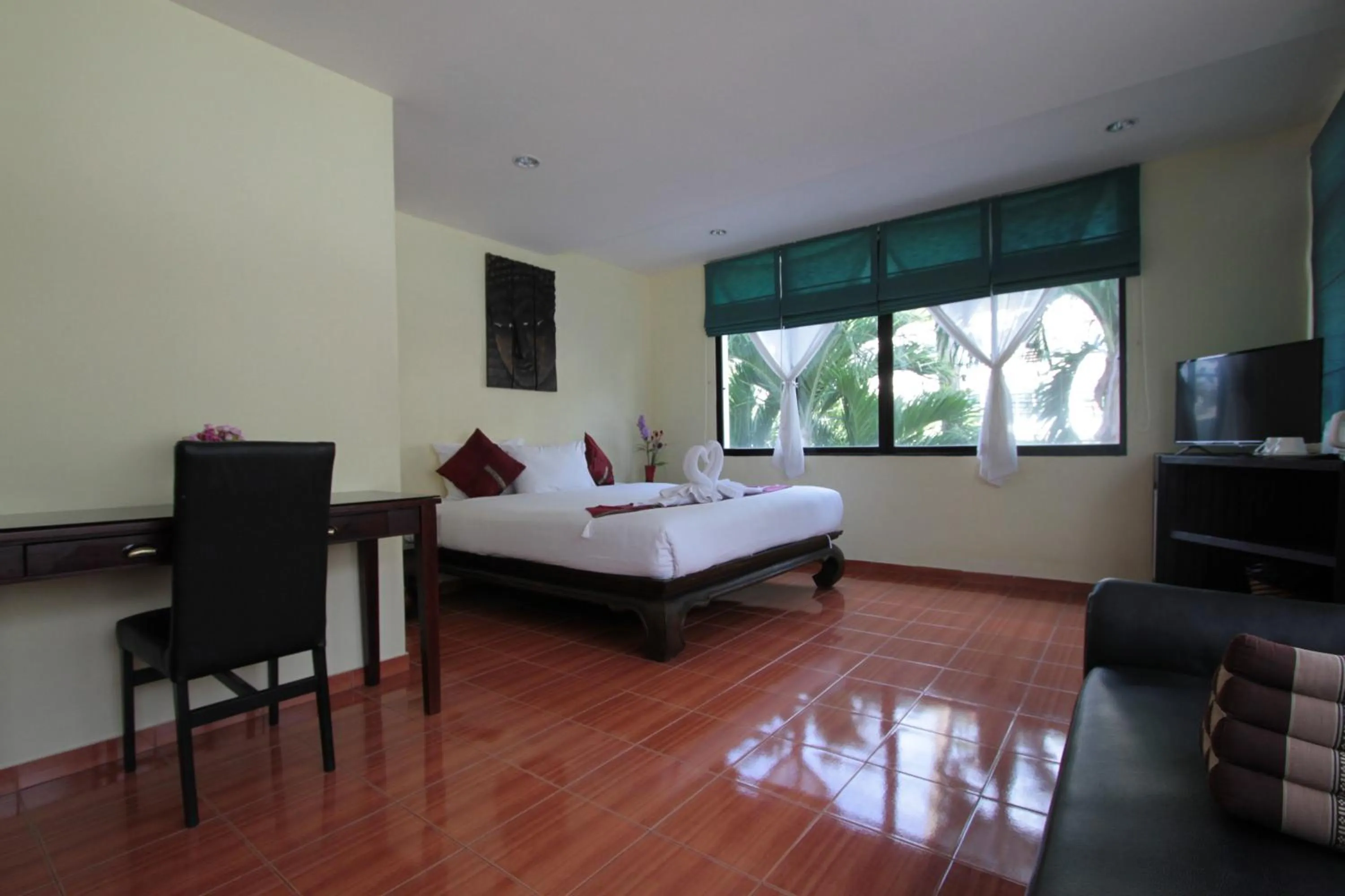 Bed in Karon Pool Hotel