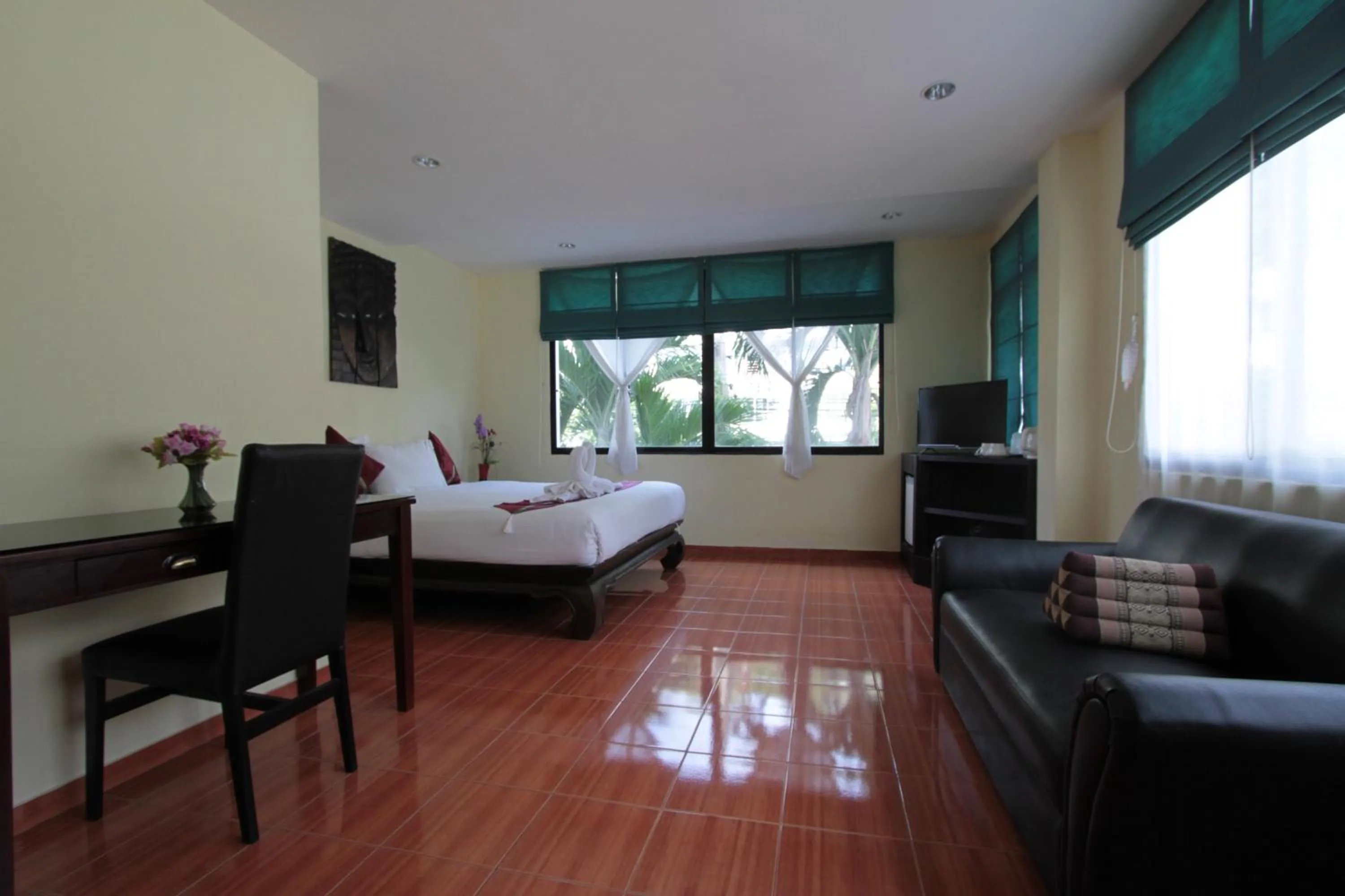 Bed in Karon Pool Hotel