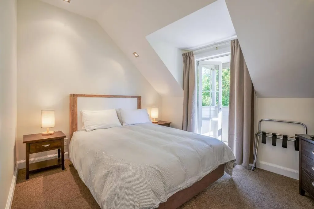 Bed in Capital Cottage 2-4 Bedroom- Russell Cottages Collection