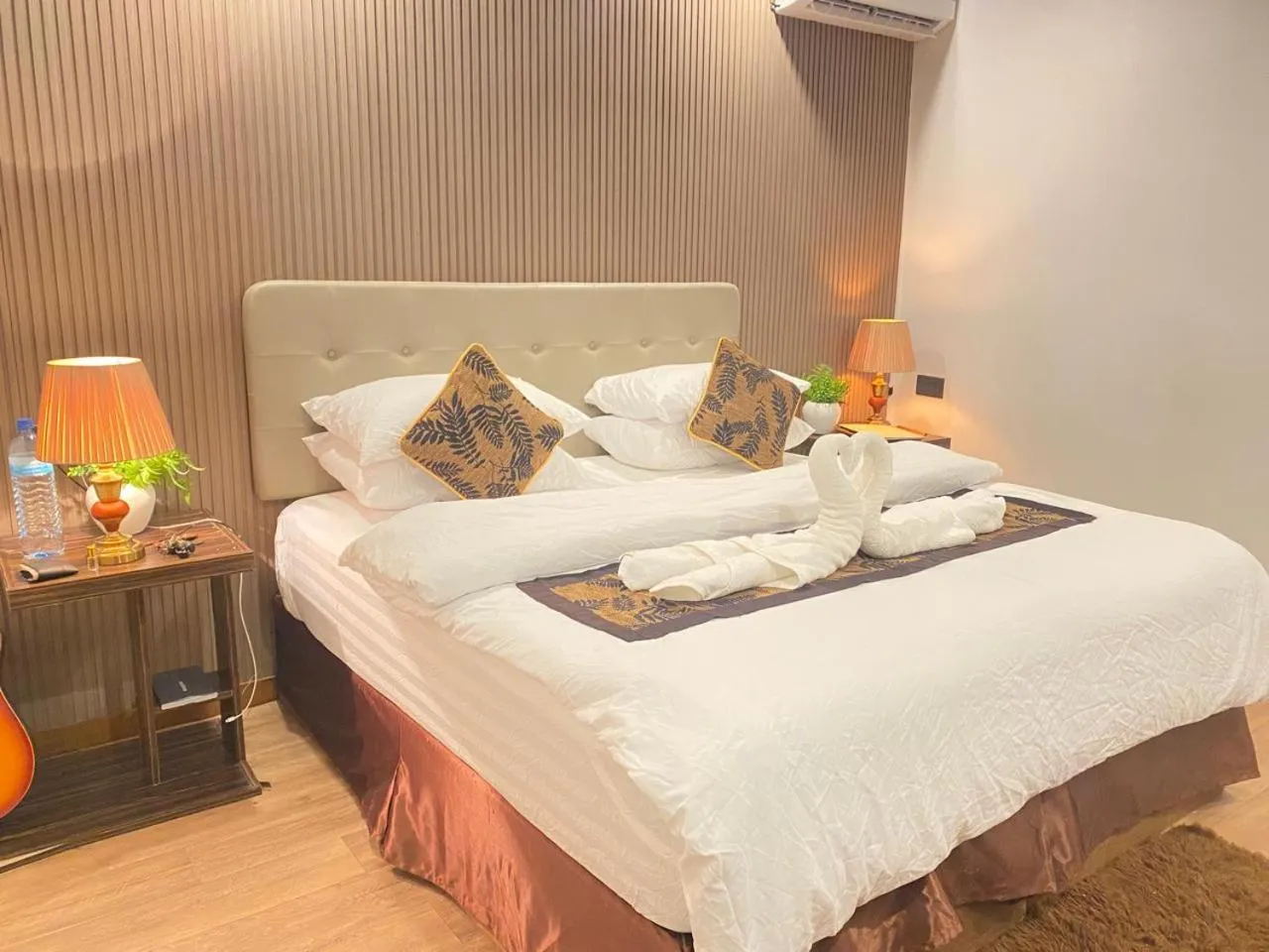 Bed in Himeyn Beach Inn - Ocho Homes by Eight Continents