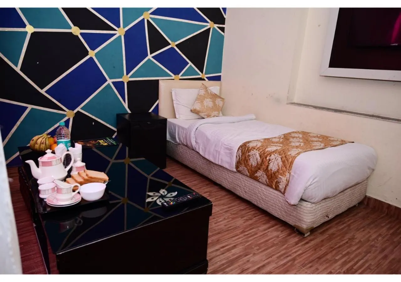 Bedroom, Bed in Hotel Krishna Pride