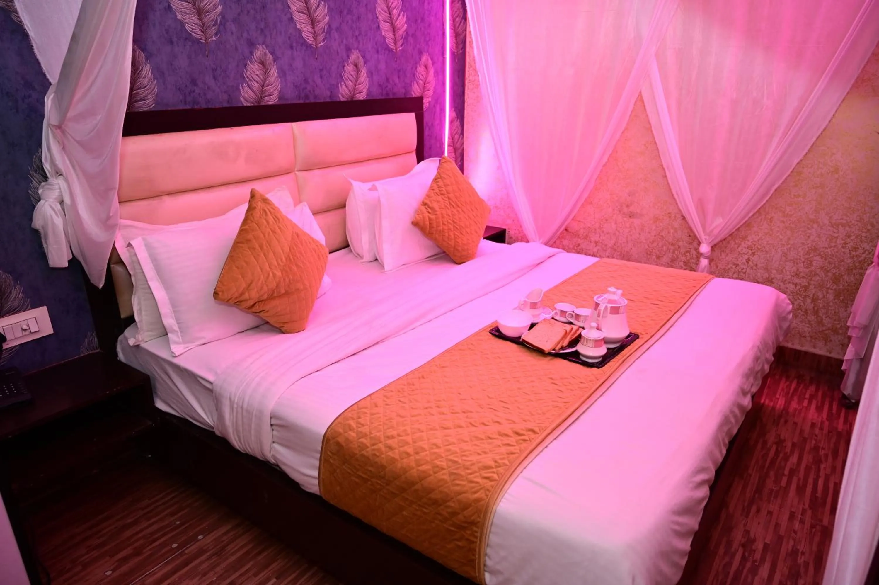 Bed in Hotel Krishna Pride
