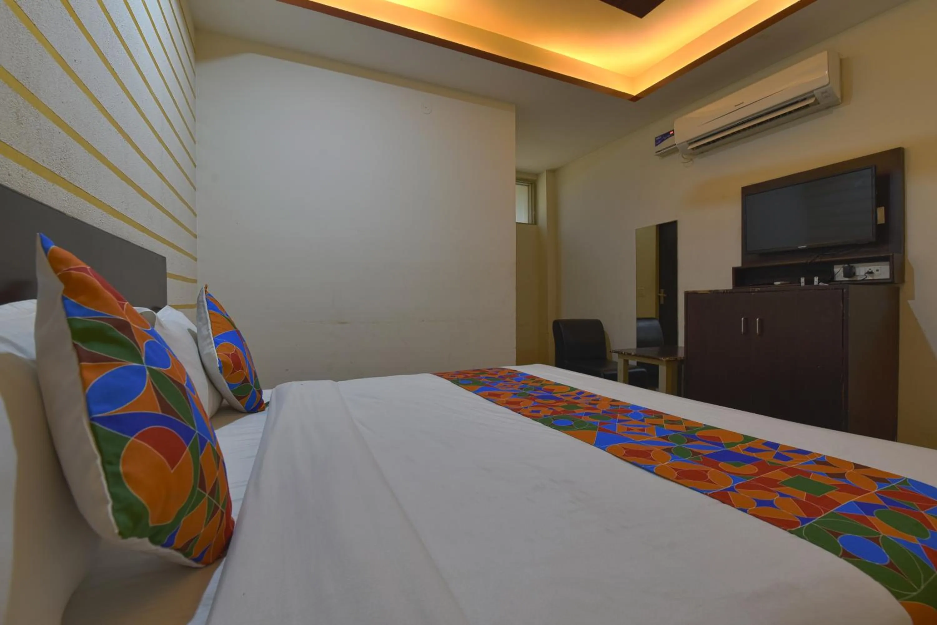 Bed in Hotel Krishna Pride