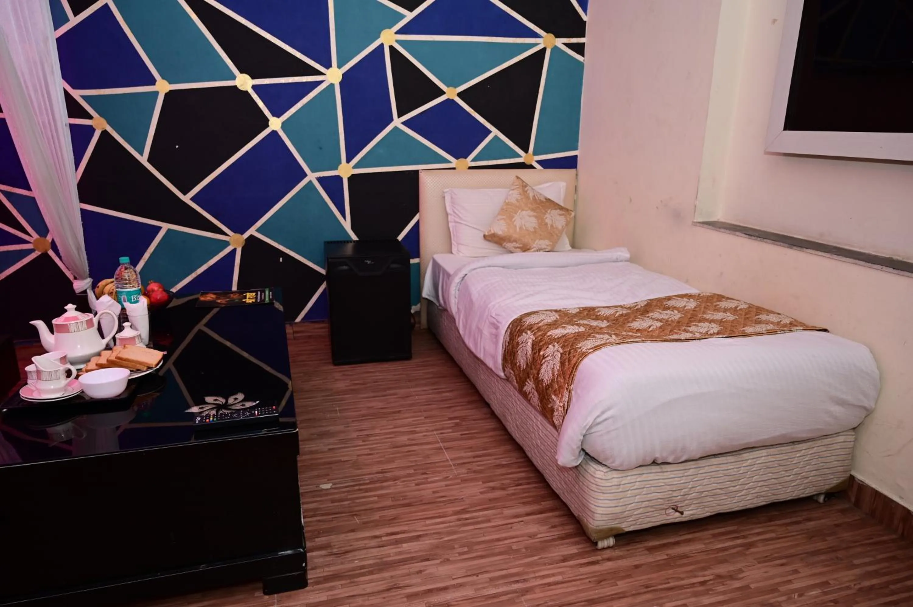 Bedroom in Hotel Krishna Pride