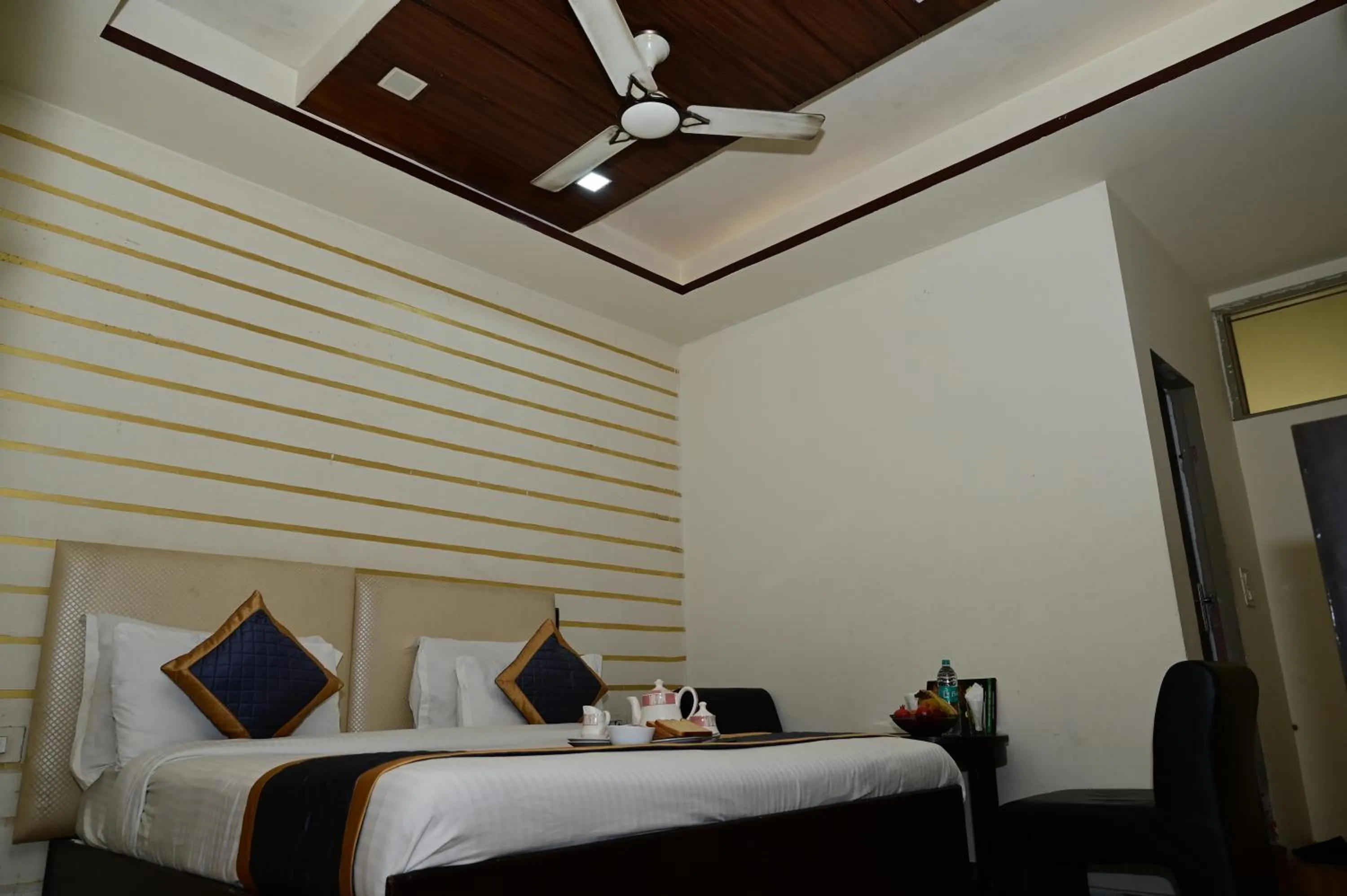 Bed in Hotel Krishna Pride