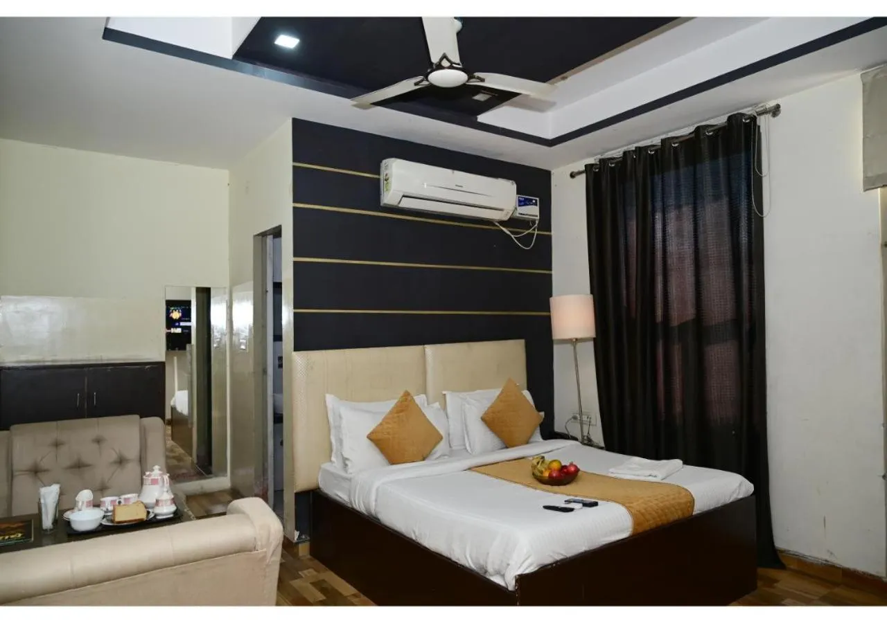 Photo of the whole room, Bed in Hotel Krishna Pride