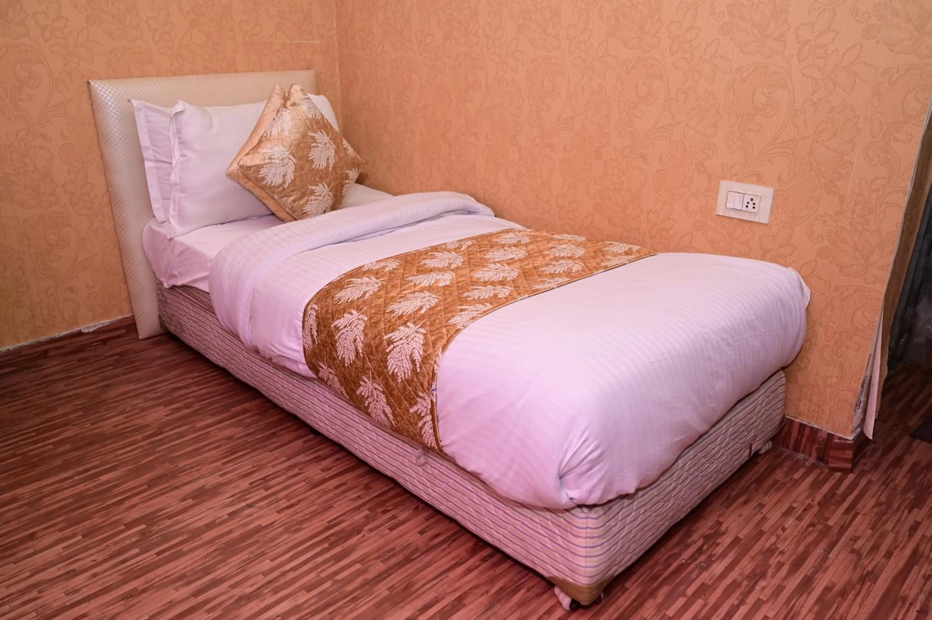 Bedroom in Hotel Krishna Pride