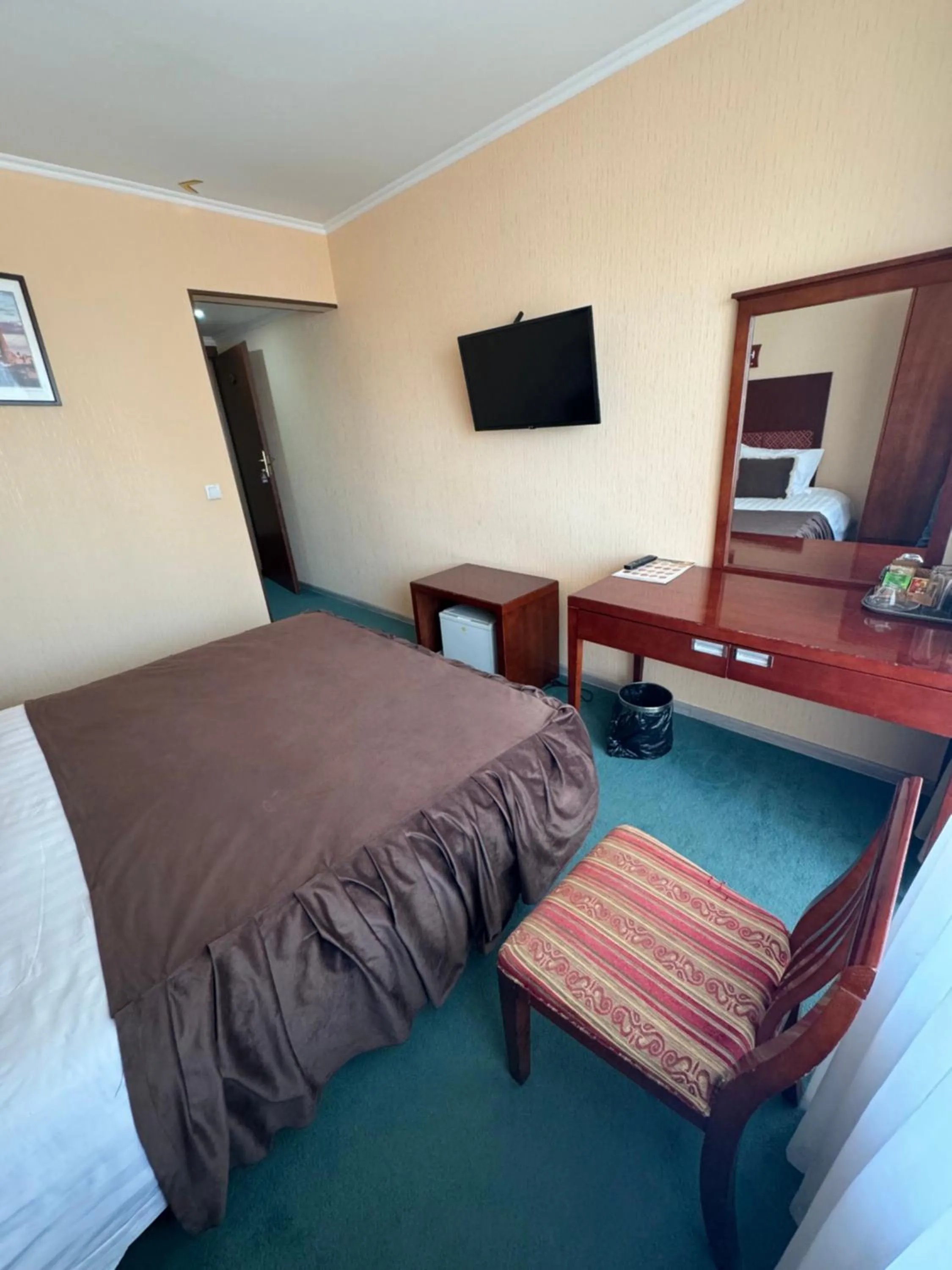 Bed in Hotel Grand Bukhara