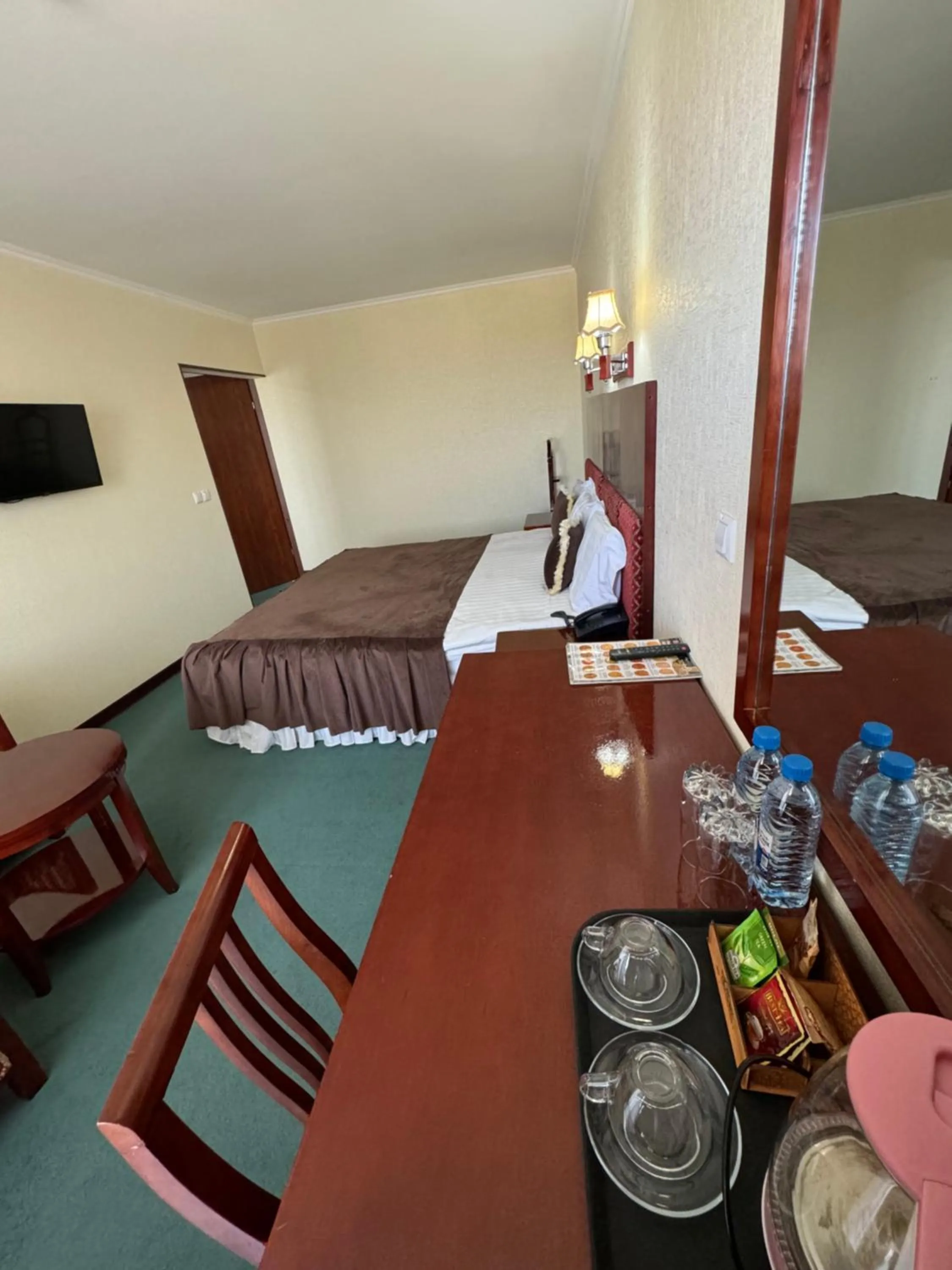 Bed in Hotel Grand Bukhara