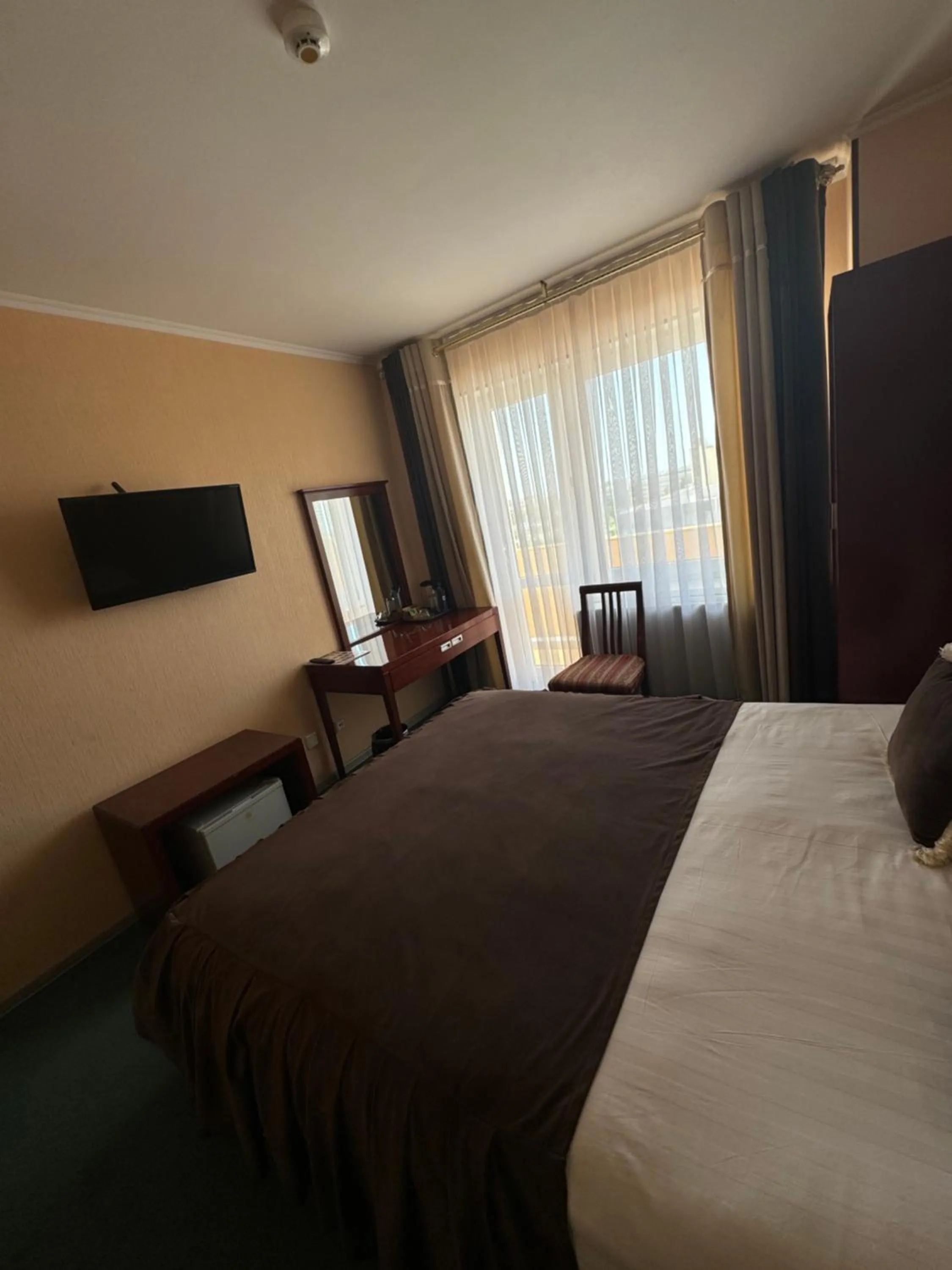 Bed in Hotel Grand Bukhara